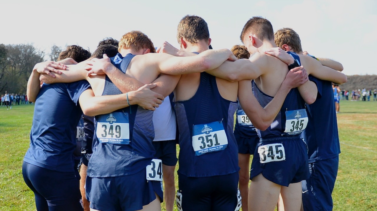 Cross country team huddle 