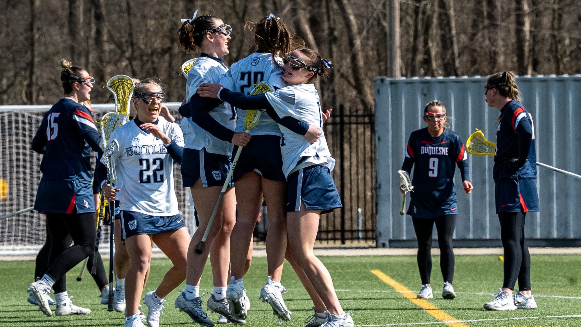WLAX- Duquesne at Butler- celebration hug