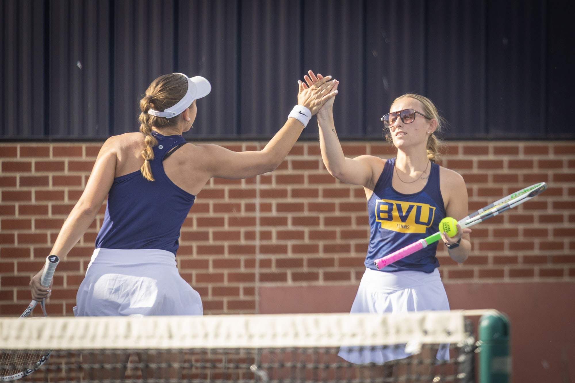Hannah Higgins and Macy Weller, BVU women's tennis vs. Wartburg
