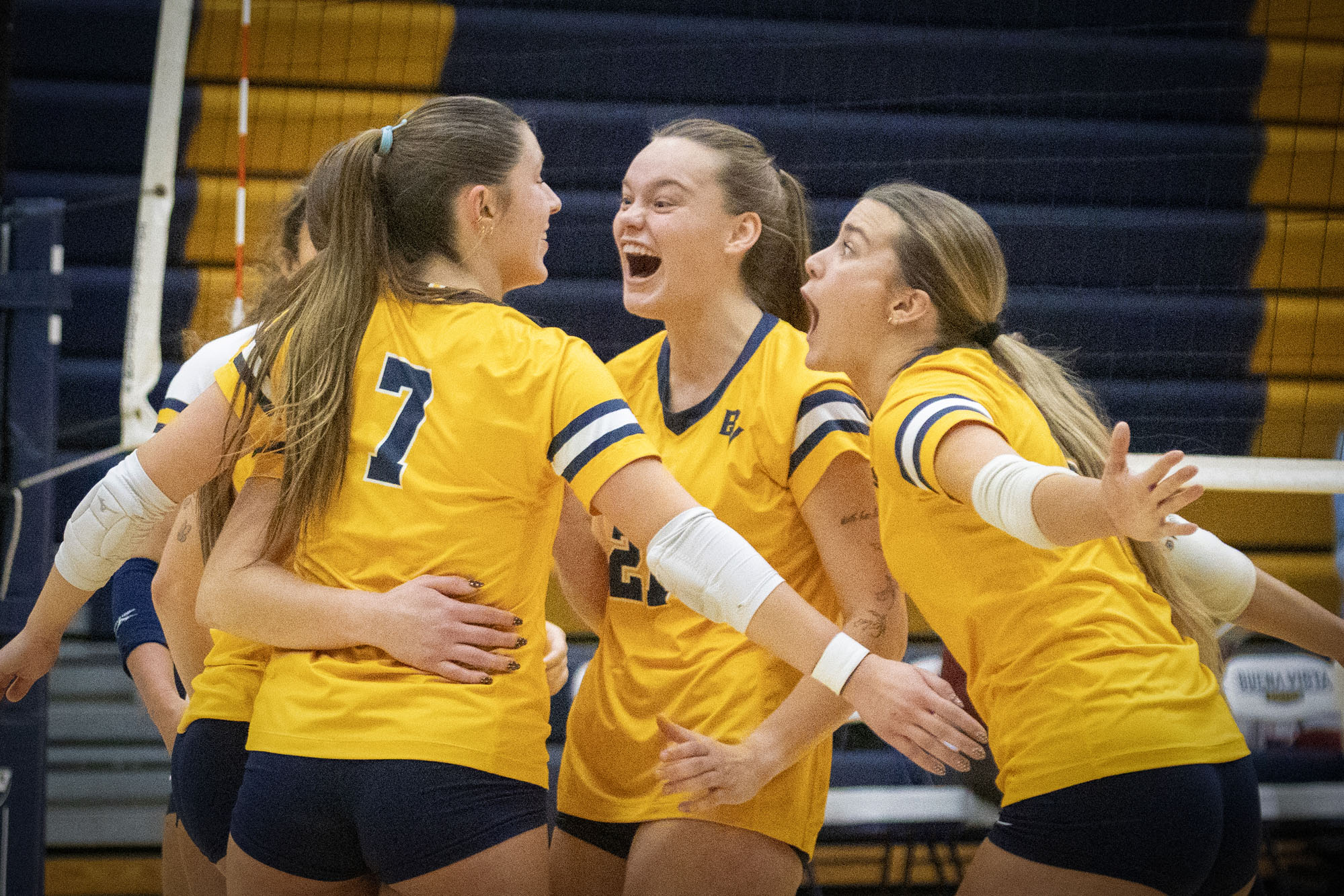 Team celebration, BVU volleyball vs. Coe