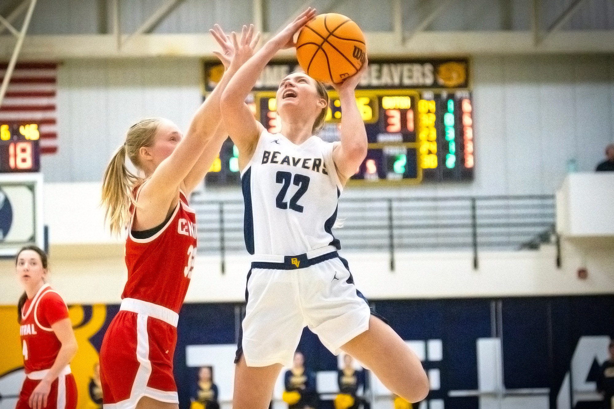 Bradi Krager drives to the basket, BVU women's basketball vs. Central