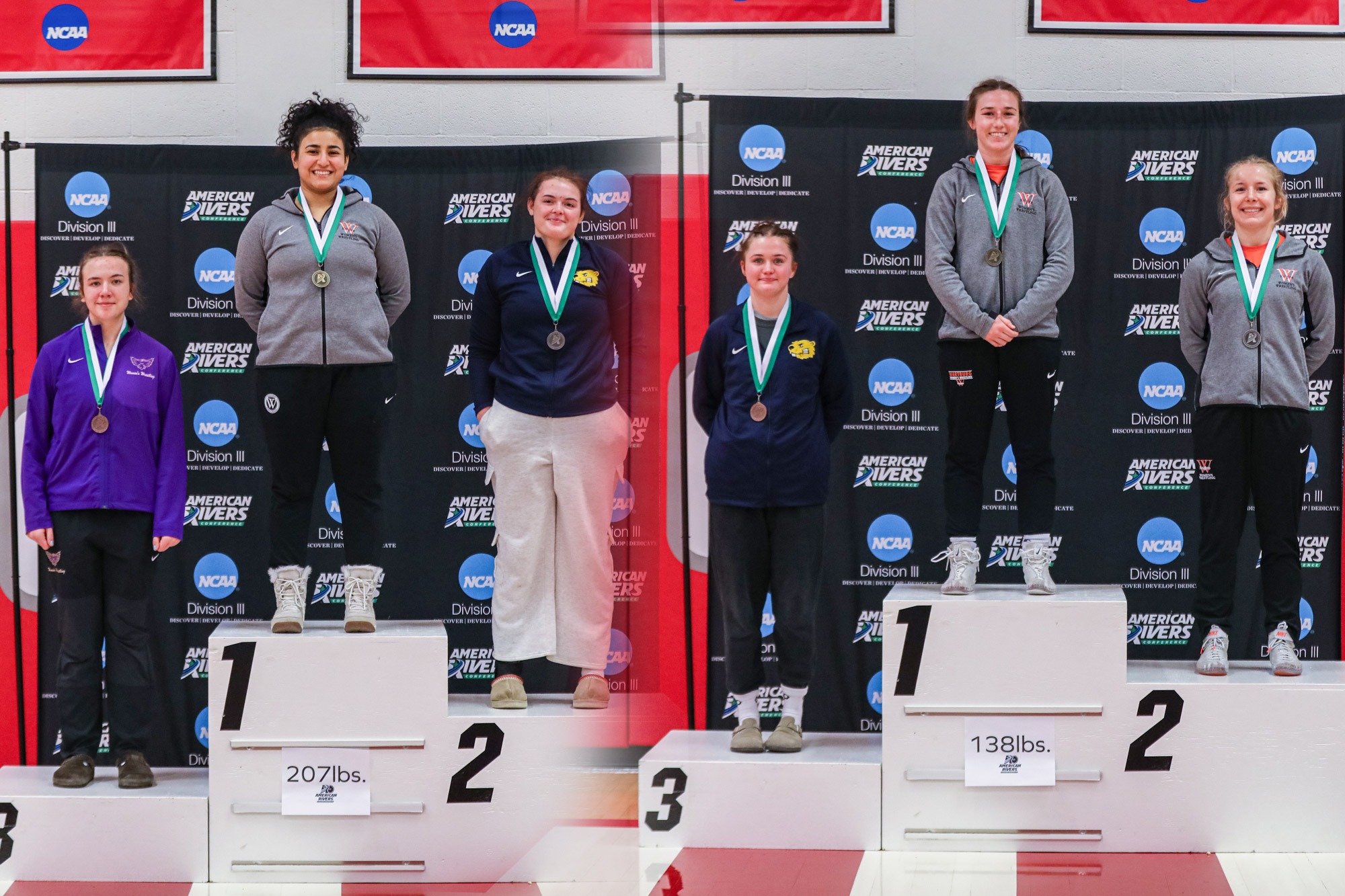 Brown and Freifeld at the podium, A-R-C women's wrestling tournament