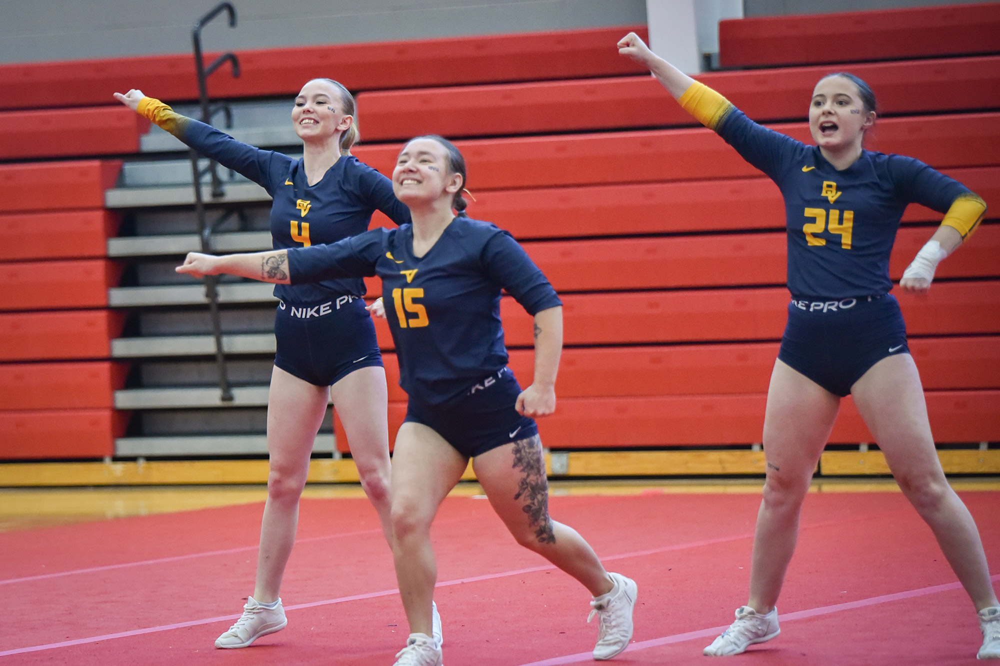 Keyanna Rote, Hanna Barker, and Cassidy Wiede; BVU STUNT at Mid America Central Conference Tournament