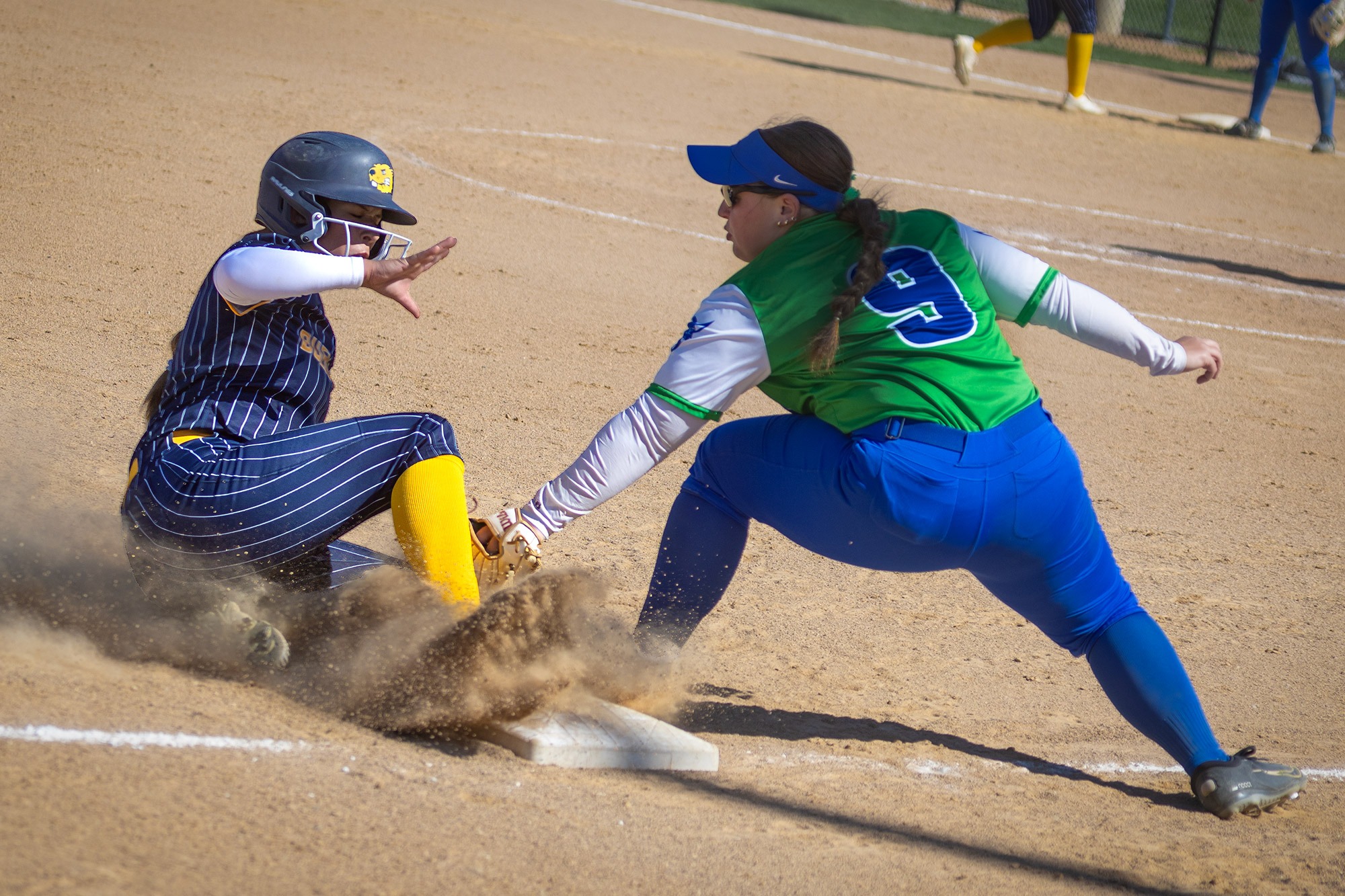Zoey Thayer is SAFE at third, BVU softball vs. Luther College