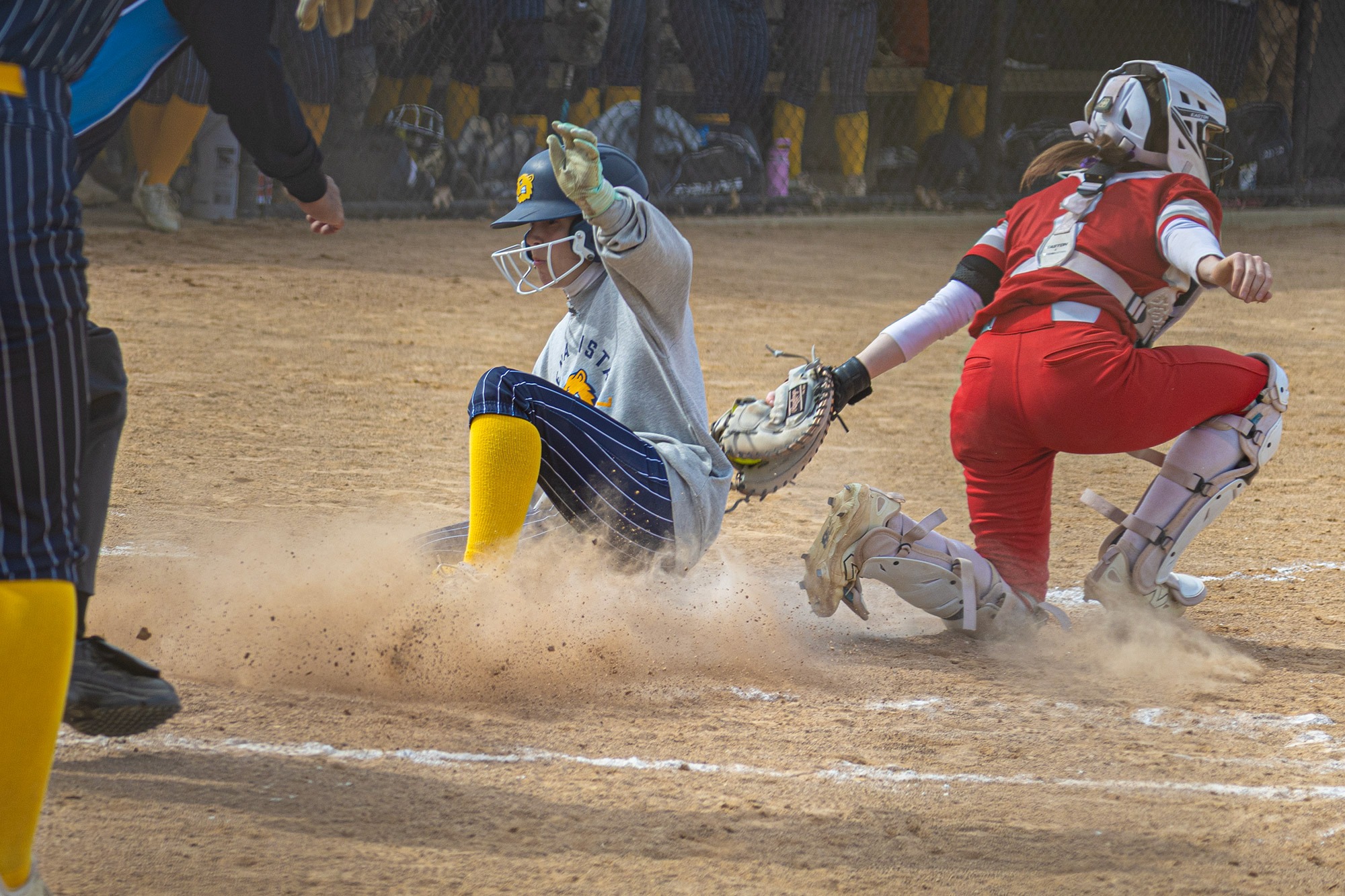 Avery France slides into home, BVU softball vs. Central