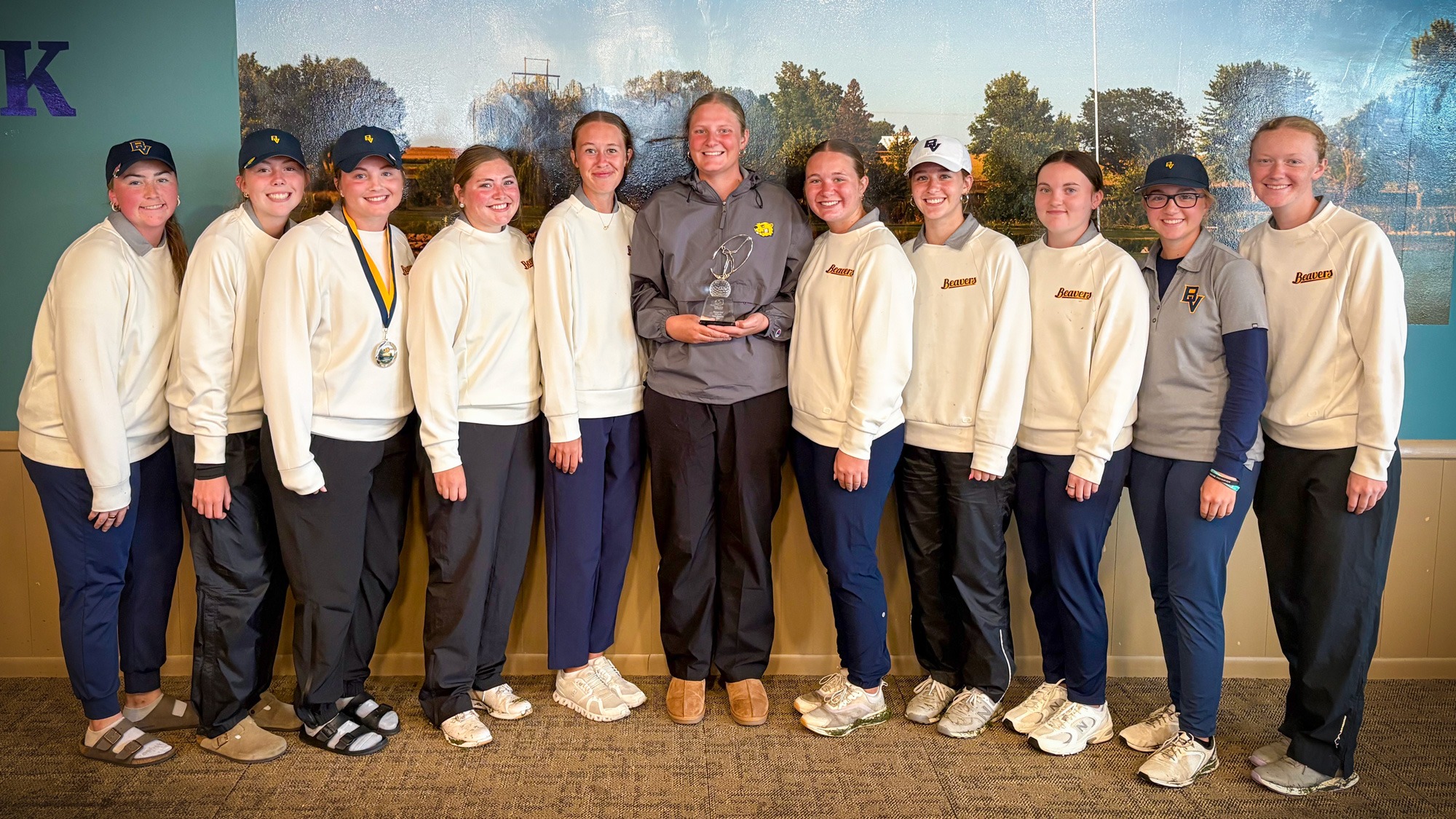 Women's Golf team with BVU Open trophy