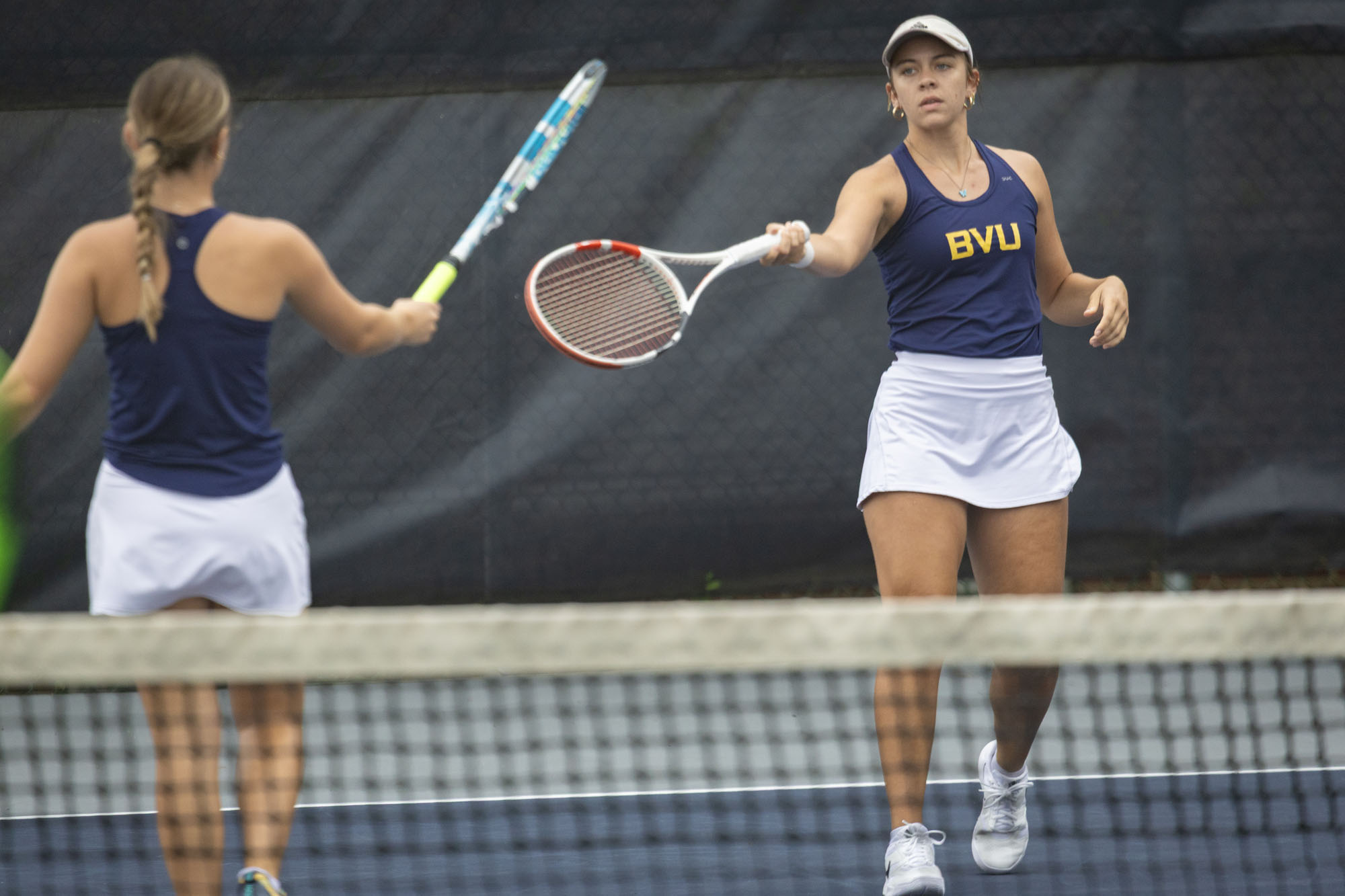 Macy Weller and Hannah Higgins, BVU women's tennis vs. Dubuque