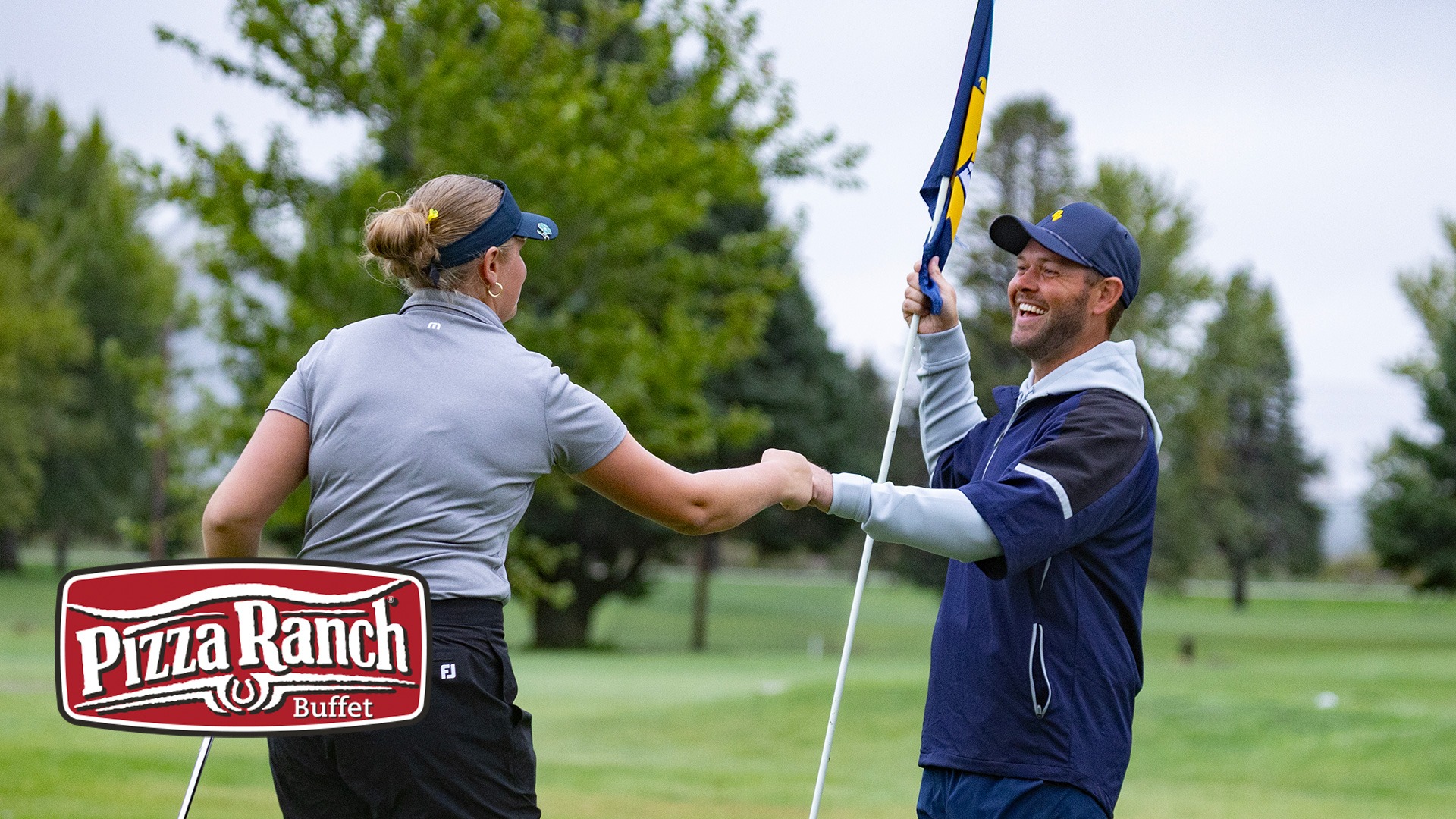 Riley Hascke and Joe Powell with Pizza Ranch logo