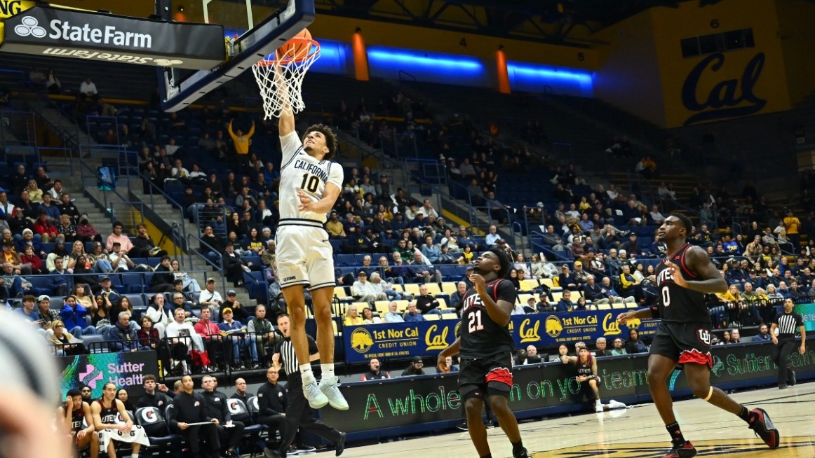 Justin Pippen rises up for a fastbreak dunk vs. Utah at Haas Pavilion