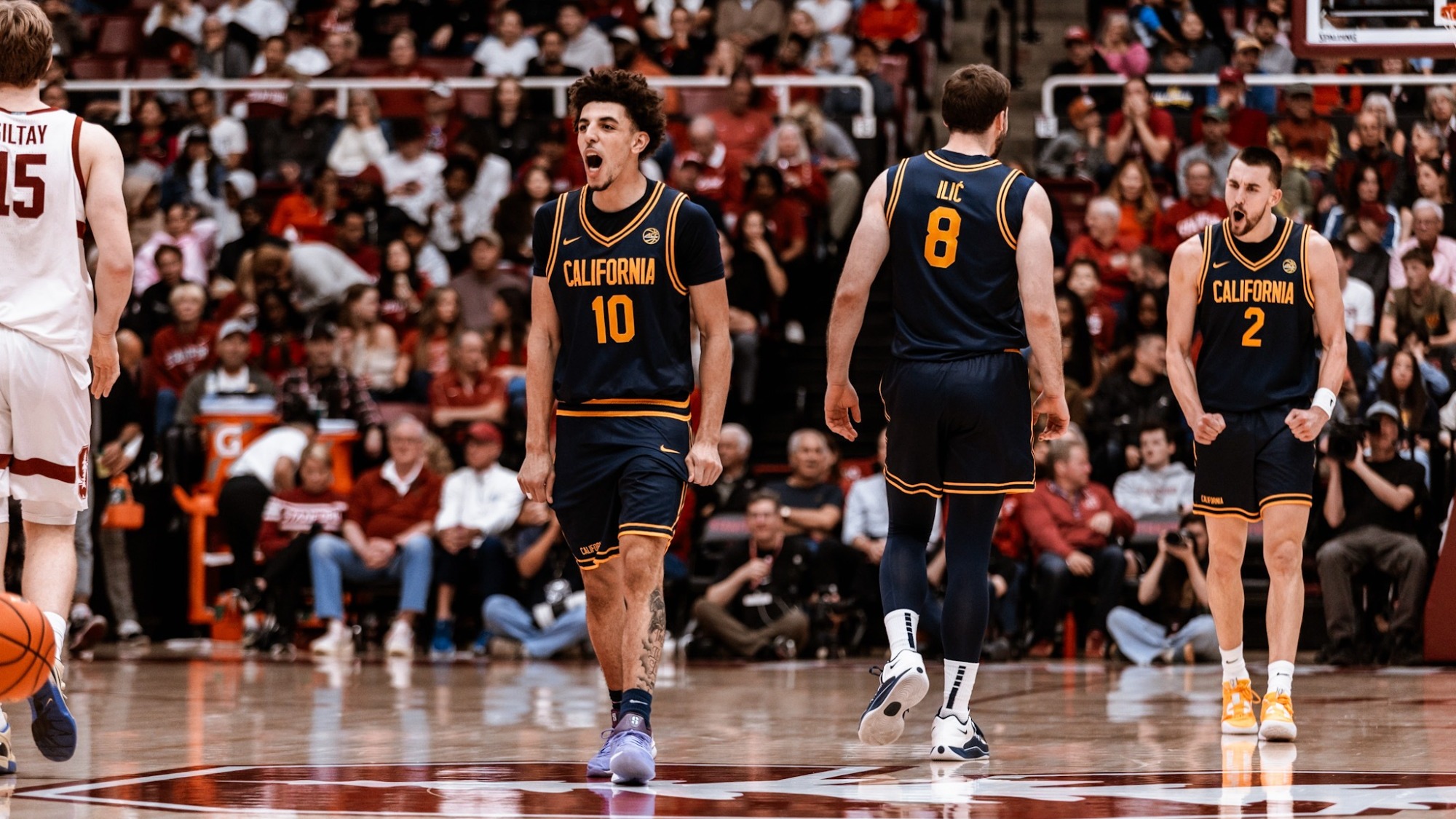 Justin Pippen and John Camden cheer during Cal's win at Stanford