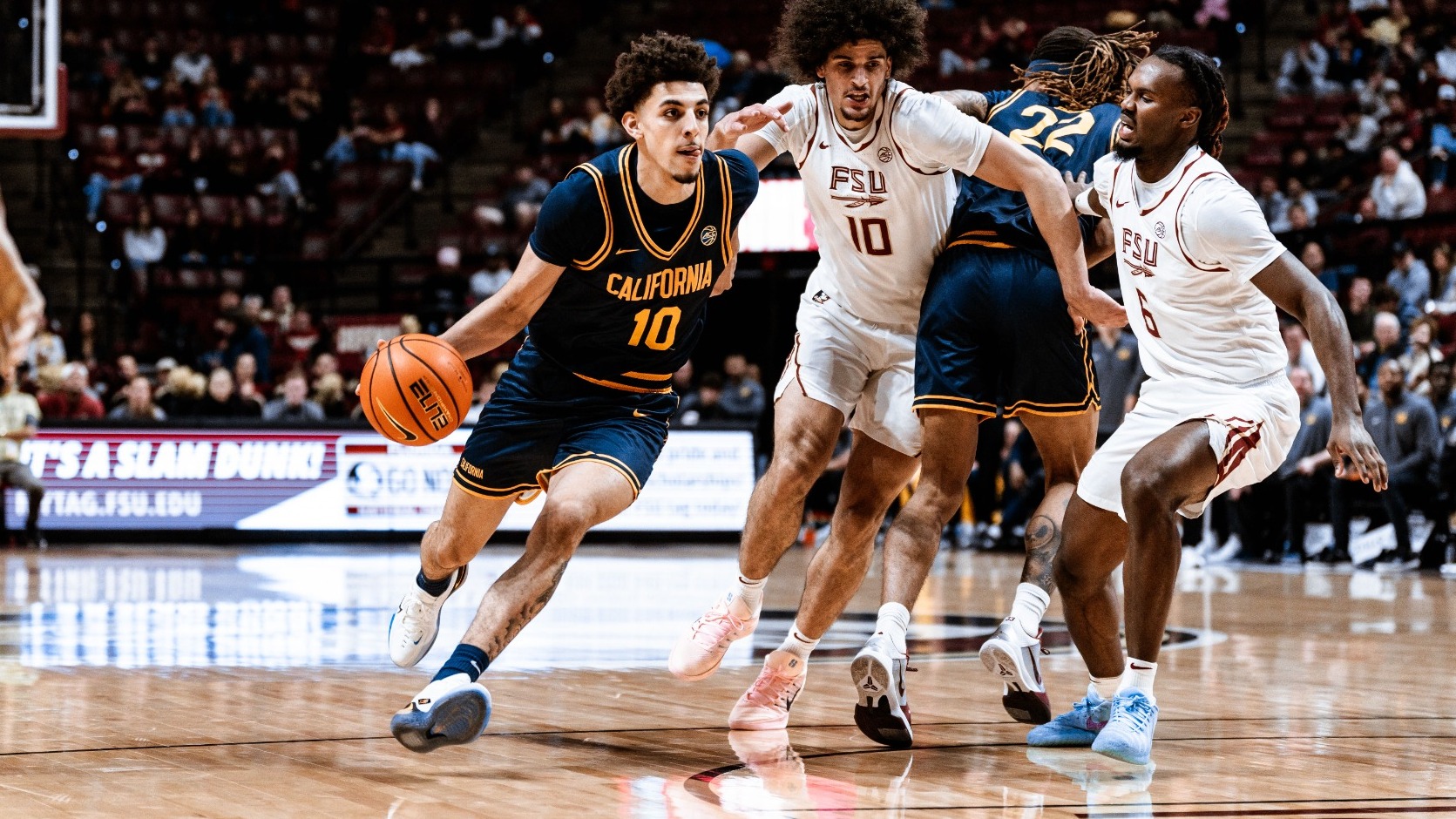 Justin Pippen drives vs. Florida State in Tallahassee