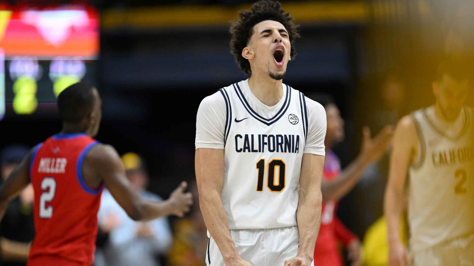Justin Pippen cheers after scoring vs. SMU in Cal's win at Haas