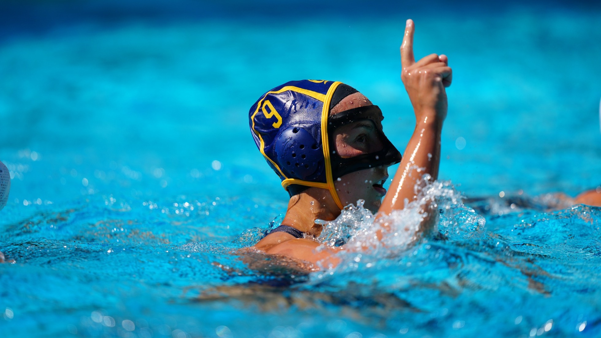 Eszter Varro celebrates a goal scored against Hawaii at Spieker Aquatics Complex