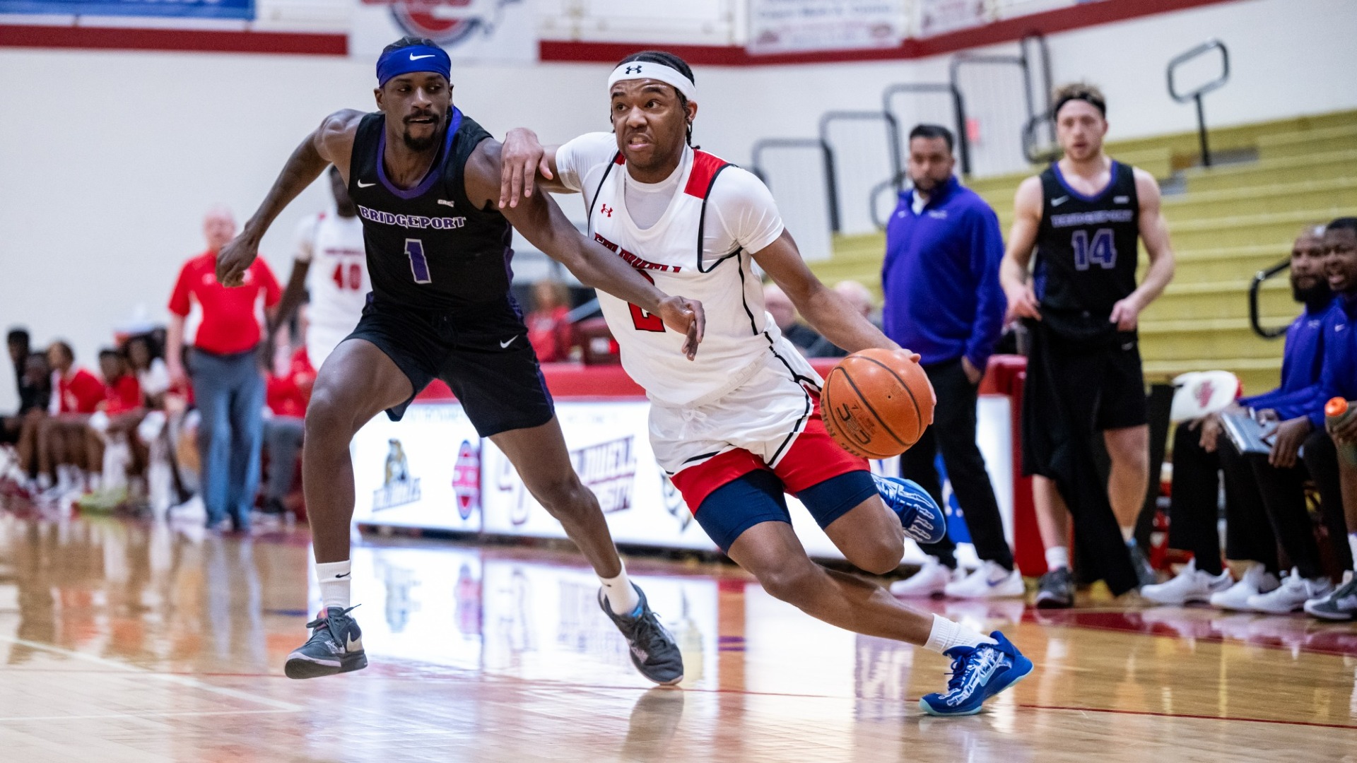 Evans Drives around defender