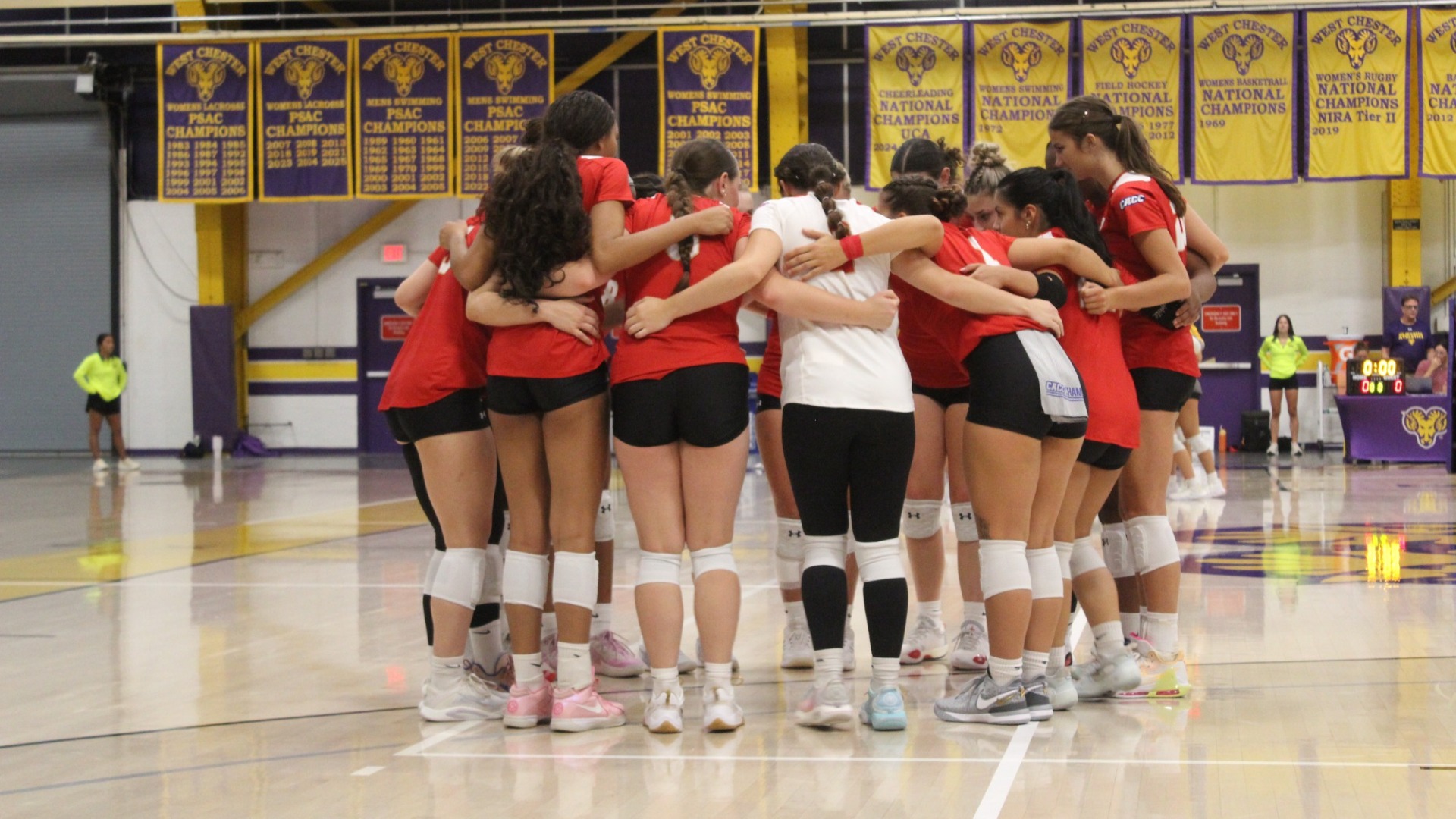 VB Team Huddle on court
