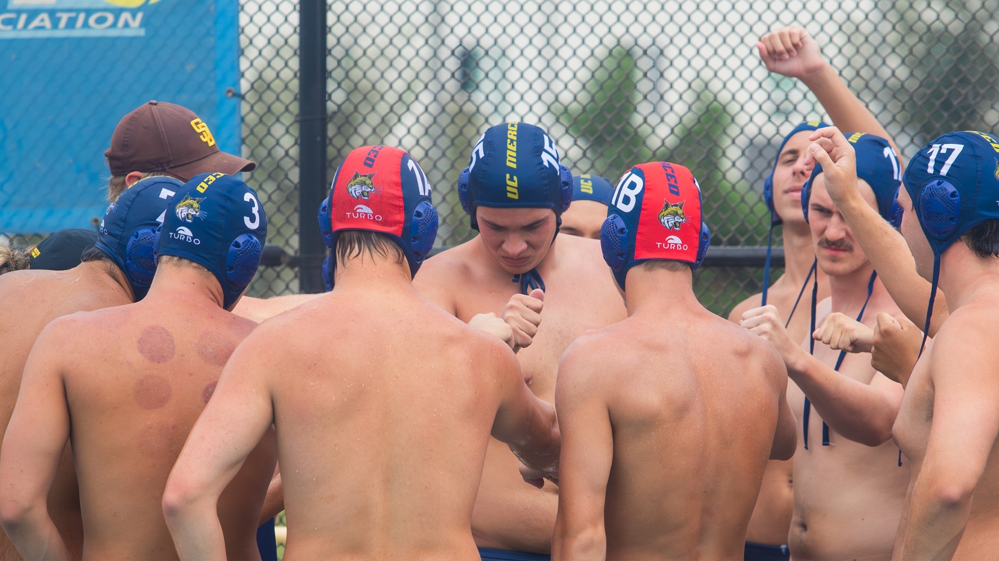 UC Merced men's water polo in a huddle on 10.1.2026