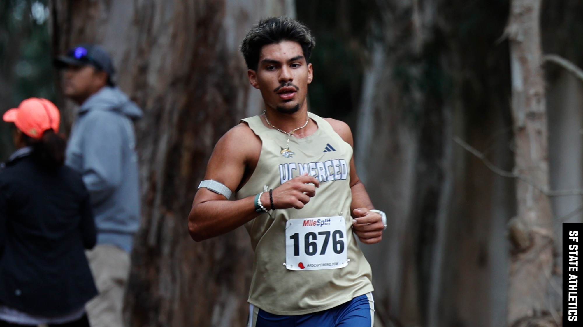 Kitto Gonzales turning the corner and running down hill at the SF State Invite on October 9, 2026