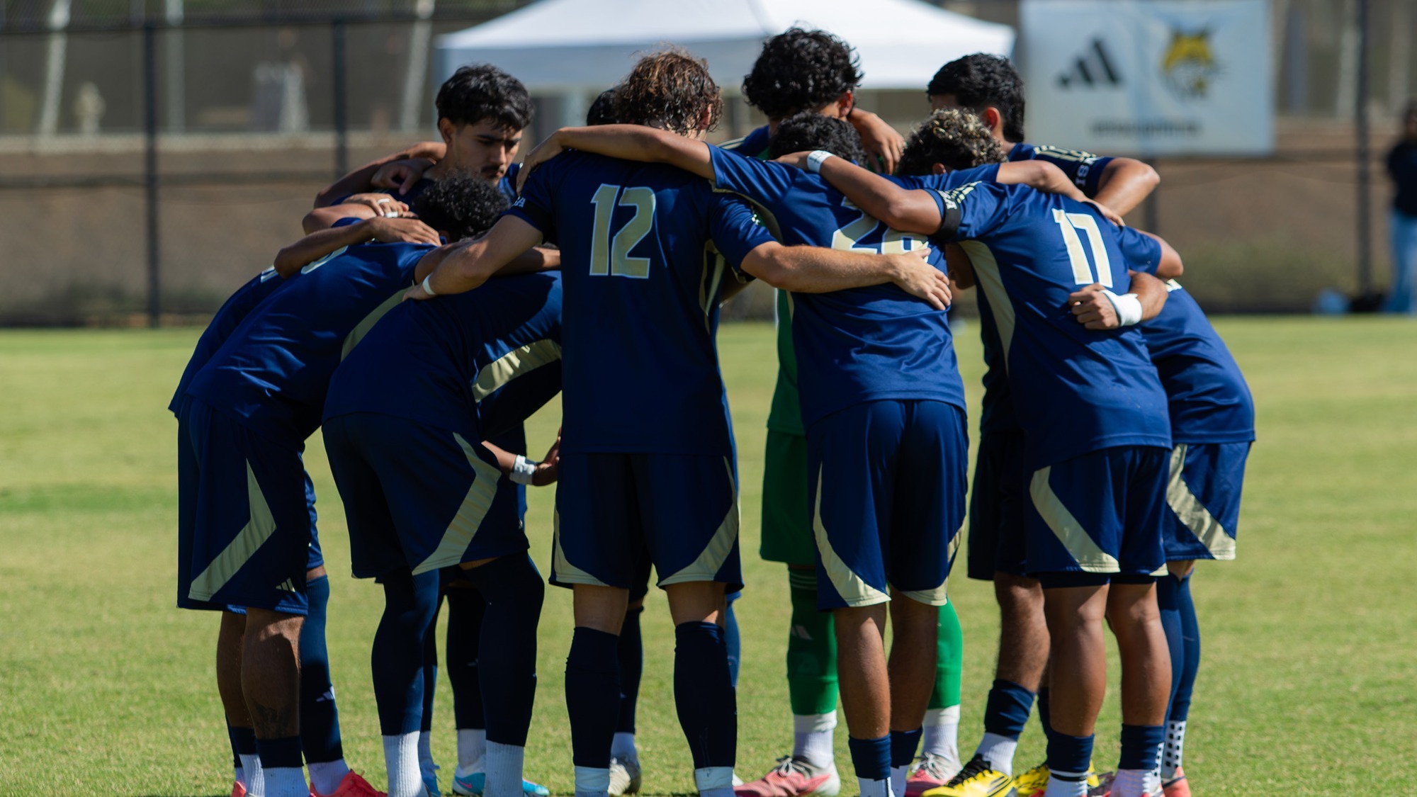 UC Merced Men's Soccer In a Huddle Prior to a Match on Bobcat Field on 10.9.2026