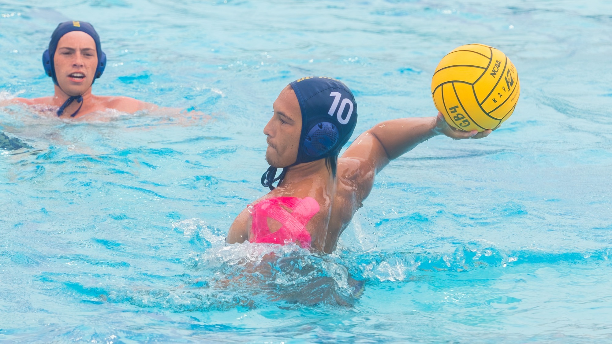 Jakee Chacon taking a shot against Brown on October 18, 2026. He is wearing cap 10.