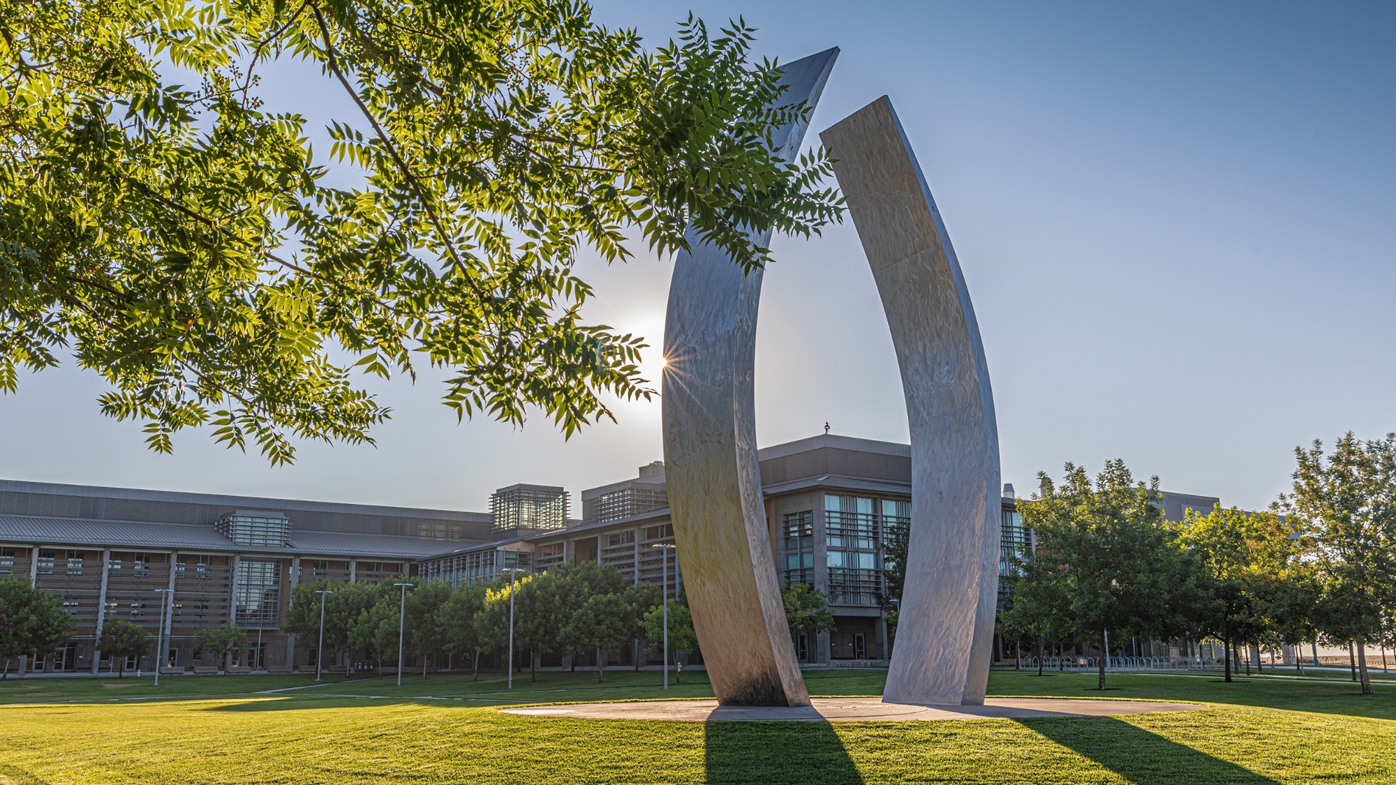 UC Merced's New Beginnings Statue on a bright sunny day