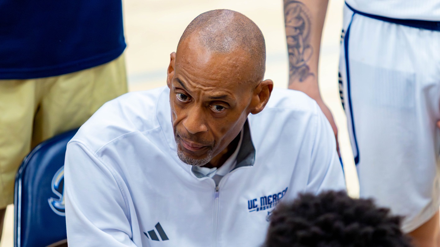 Gary Stewart coaching his team during a timeout.