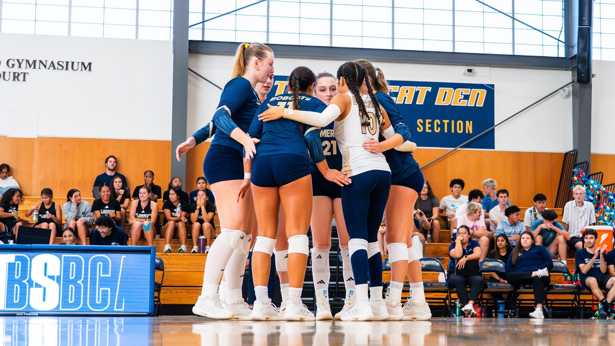 Bobcats huddling on Hostetler Court in a match vs. CSUSB on September 19, 2026