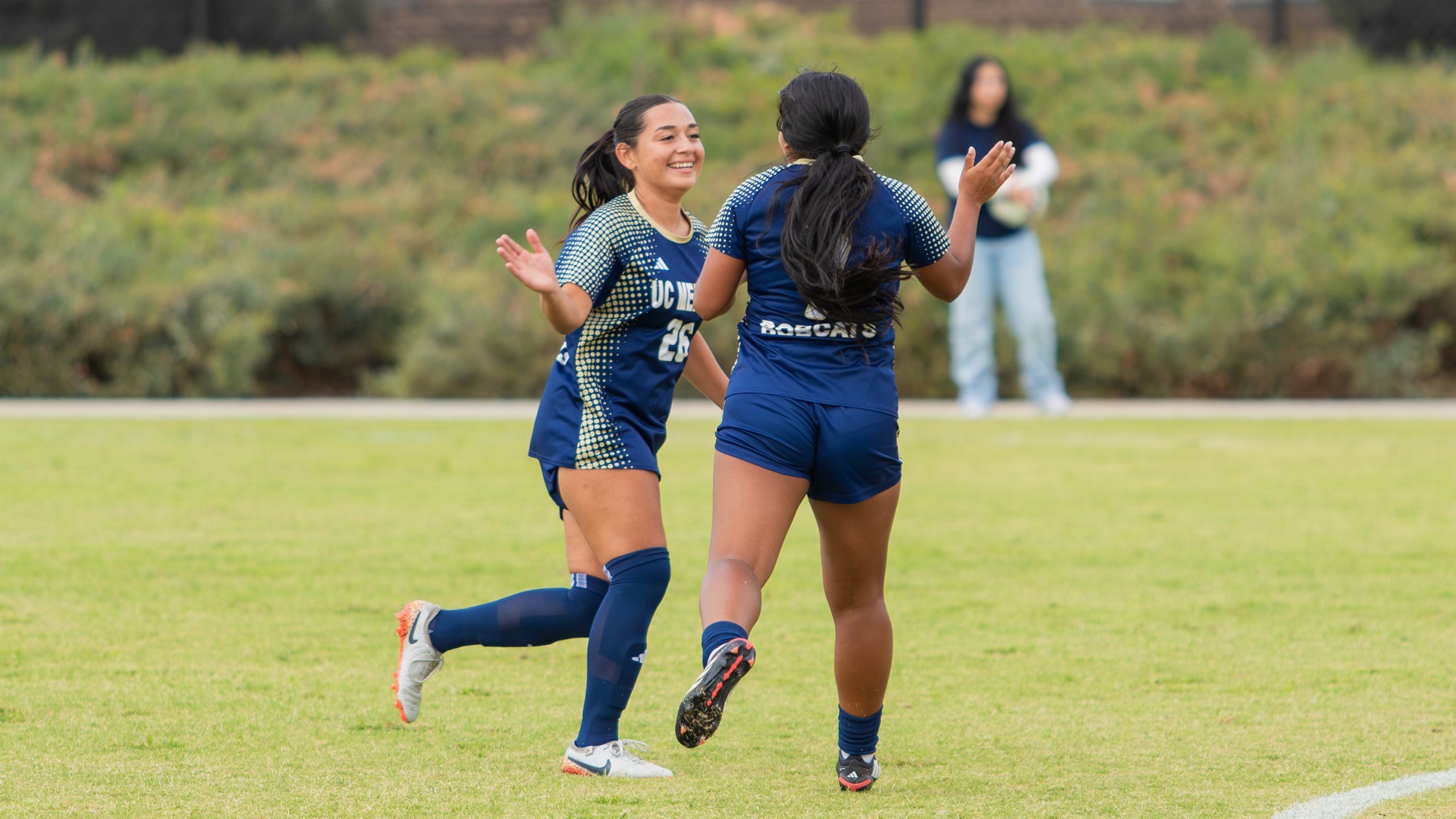 Jocelin Roa and Alexia Alva celebrate a goal against Fresno Pacific on Bobcat Field on 9.20.2026