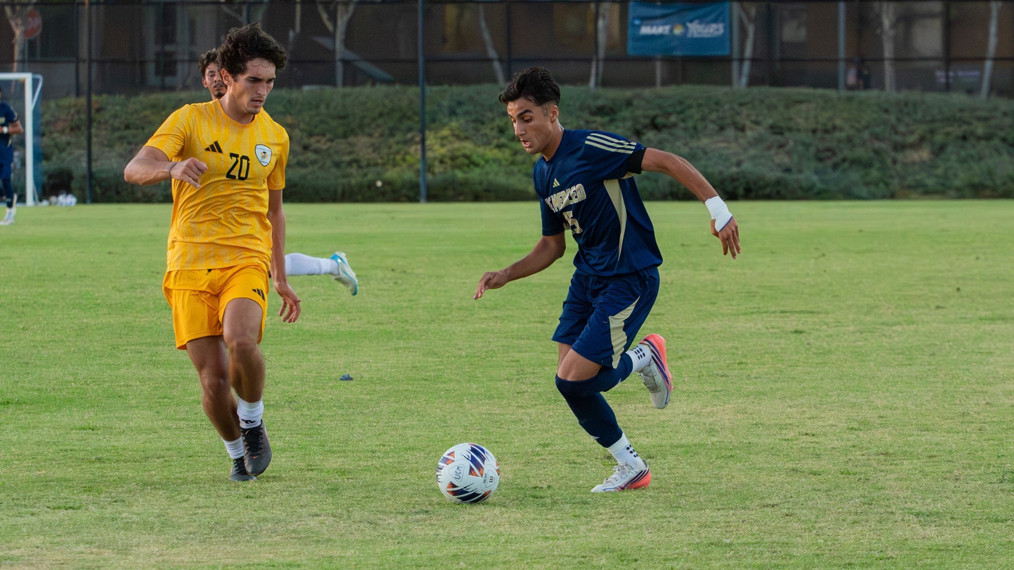 Christian Khanishian taking his defender into the box on Bobcat Field.