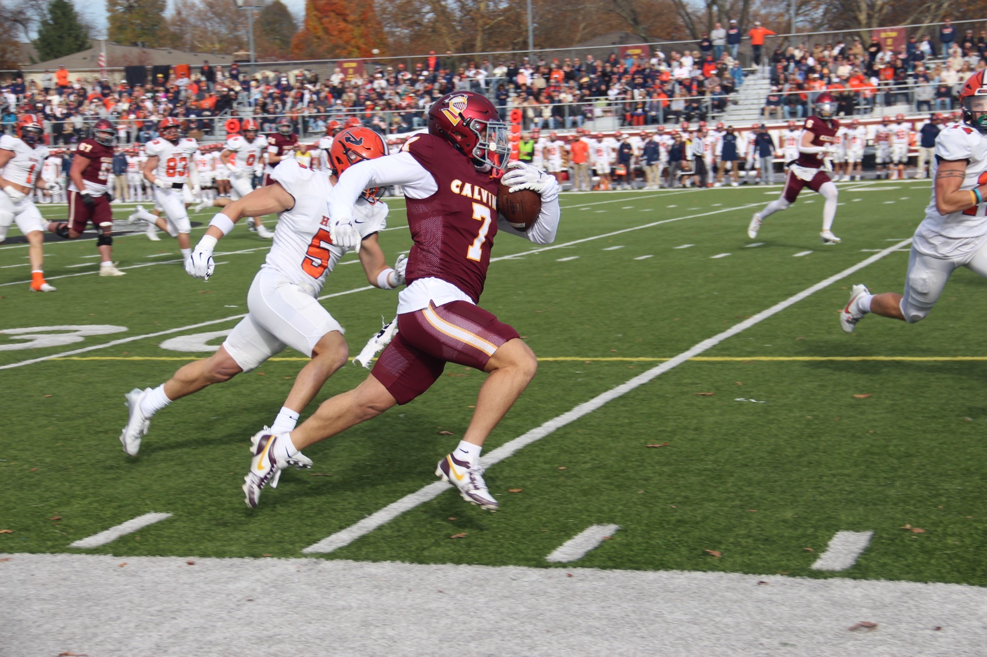 Hunter Hogan races ball up sideline against Hope - 11-9-24