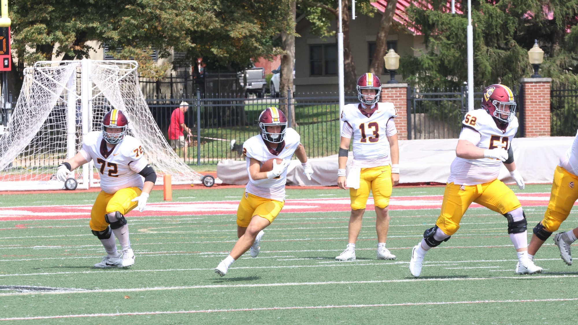 Hayden Slegers carries the ball vs Otterbein on 9-5-26