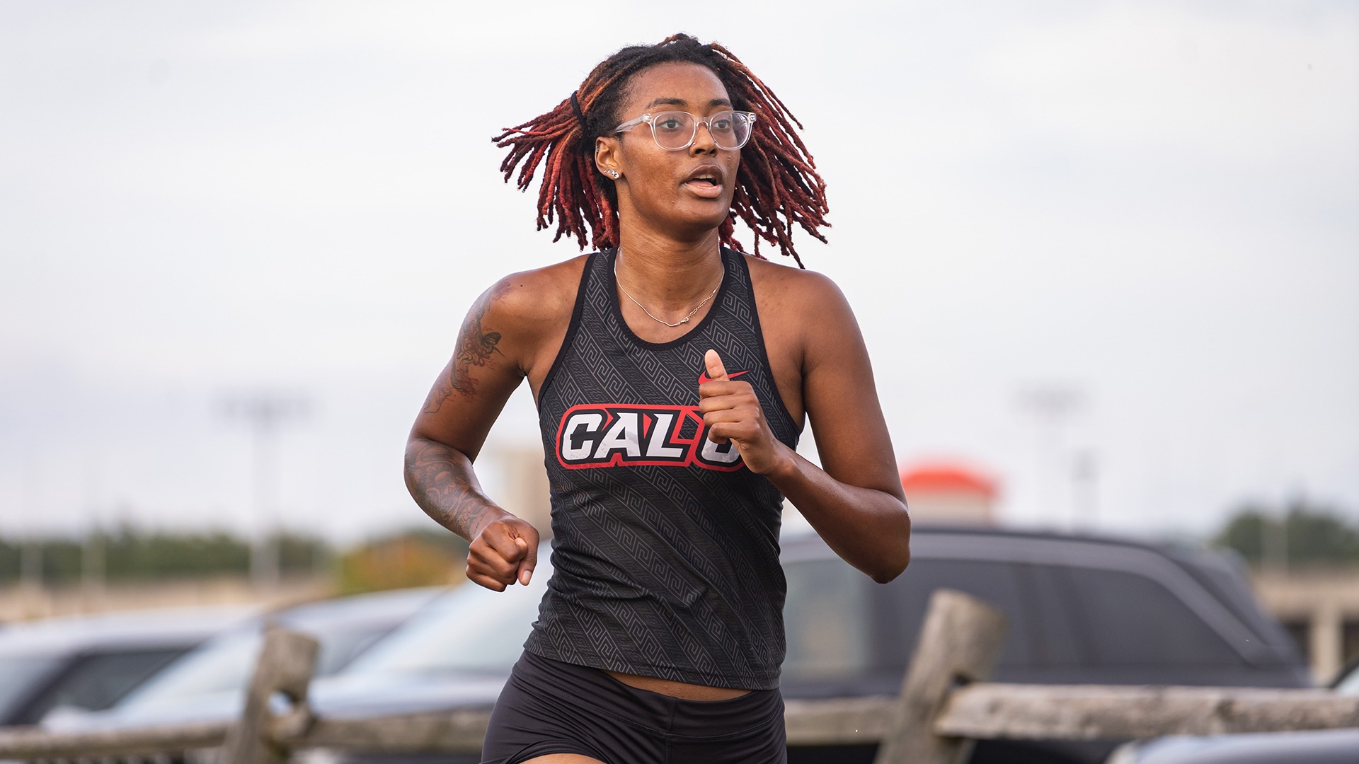 Gabriella Fralin competes on the course during a cross country meet.   