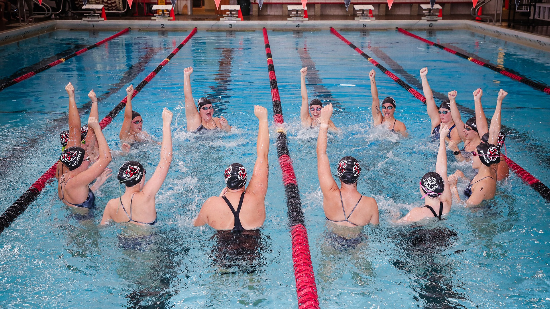 swimming spring 2026 huddle in water