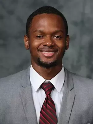 Headshot of Justin Moore, Wide Receivers Coach [2026]