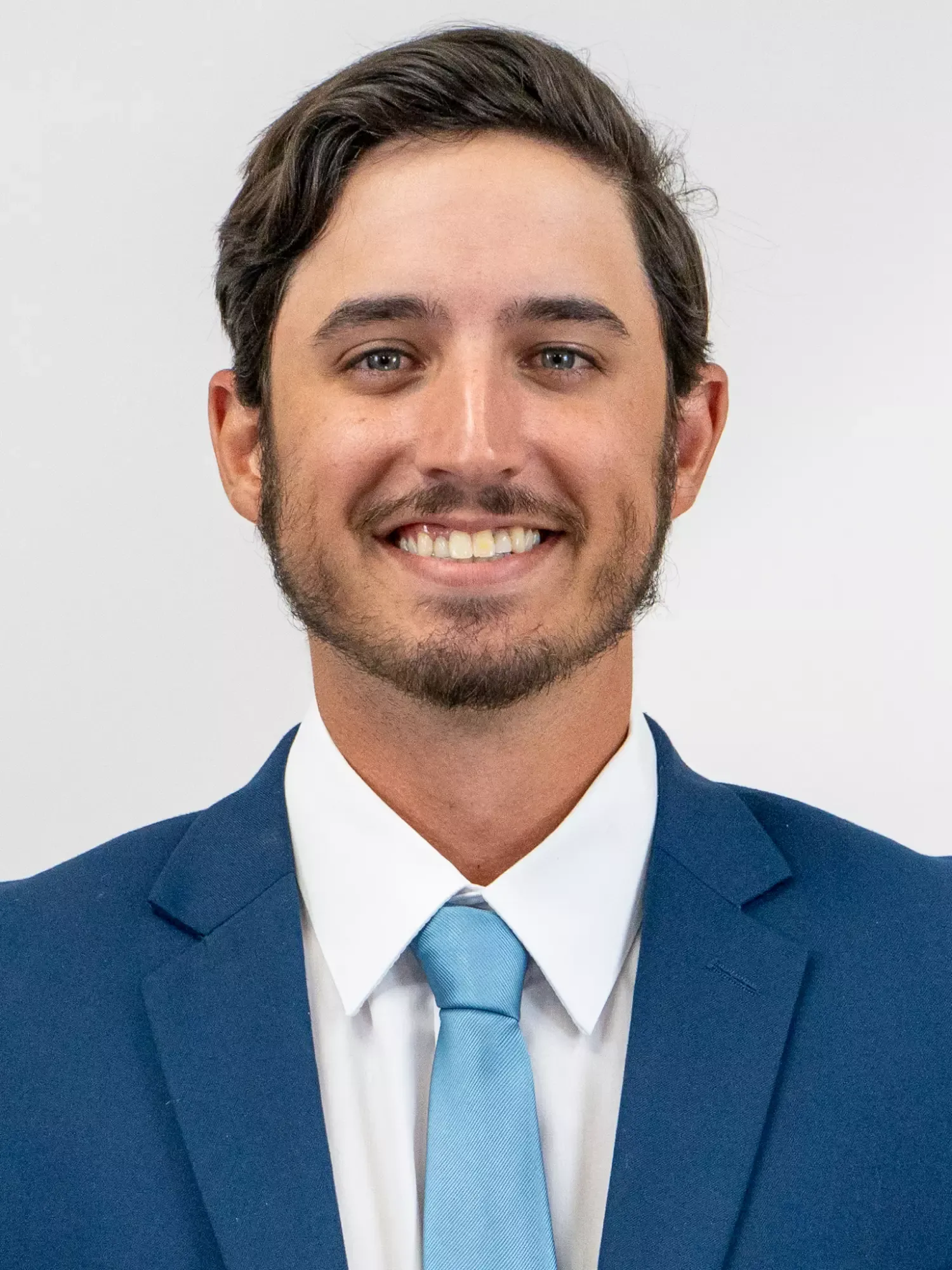 Tyler Kaman; Head Men's & Women's Golf Coach