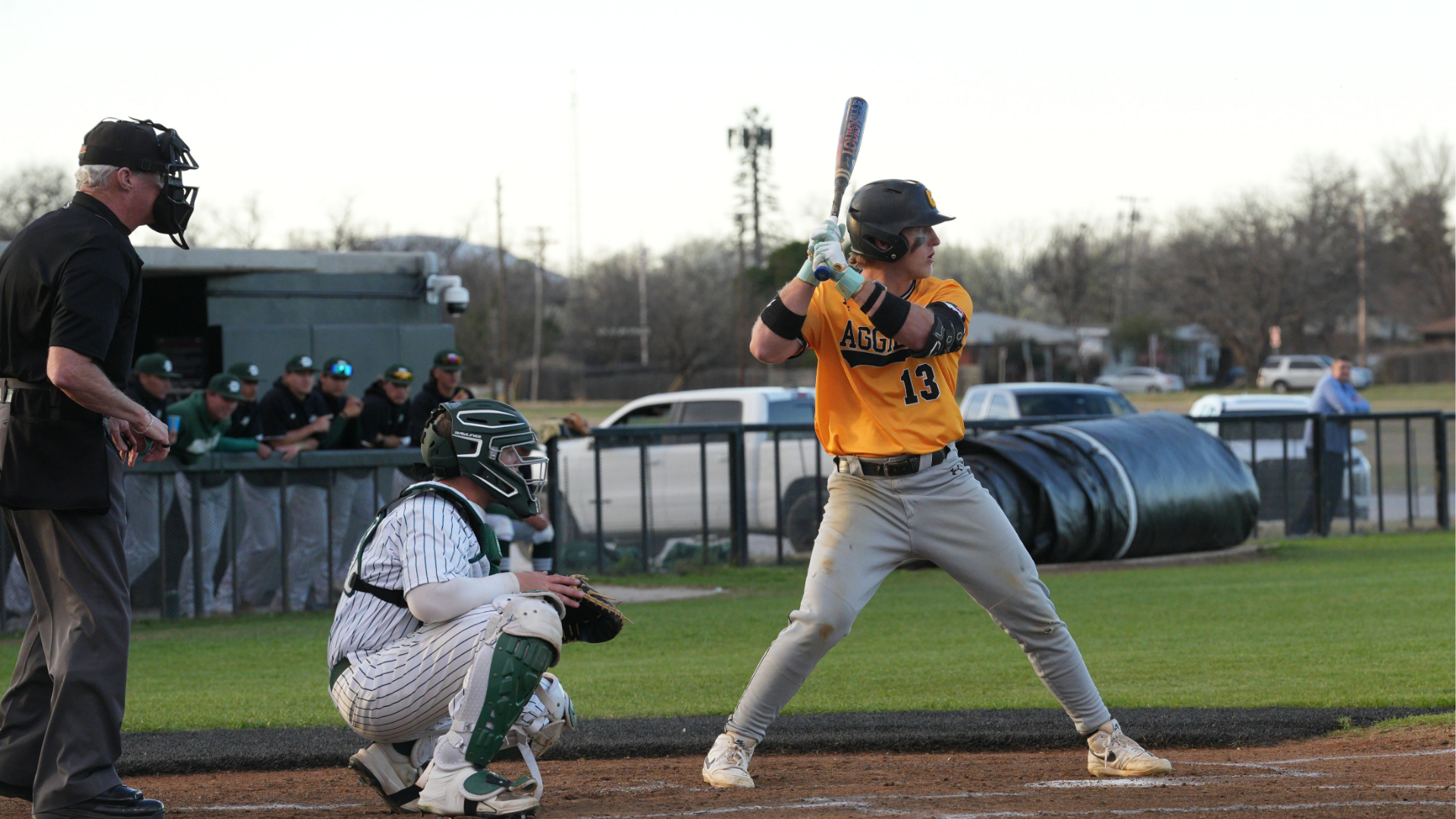 Baseball Player Jackson Herrell at bat with UT Dallas Catcher