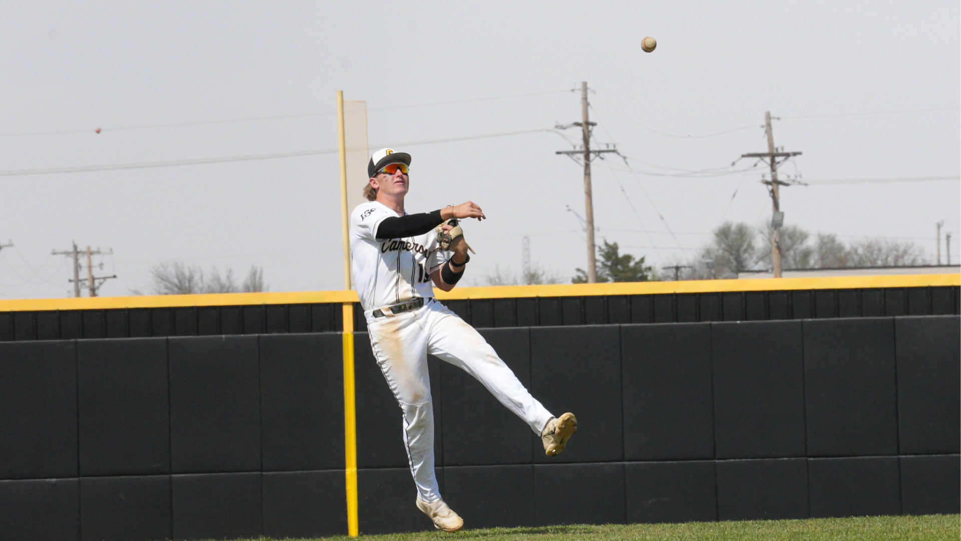 Baseball Player Jackson Harrell makes play at game