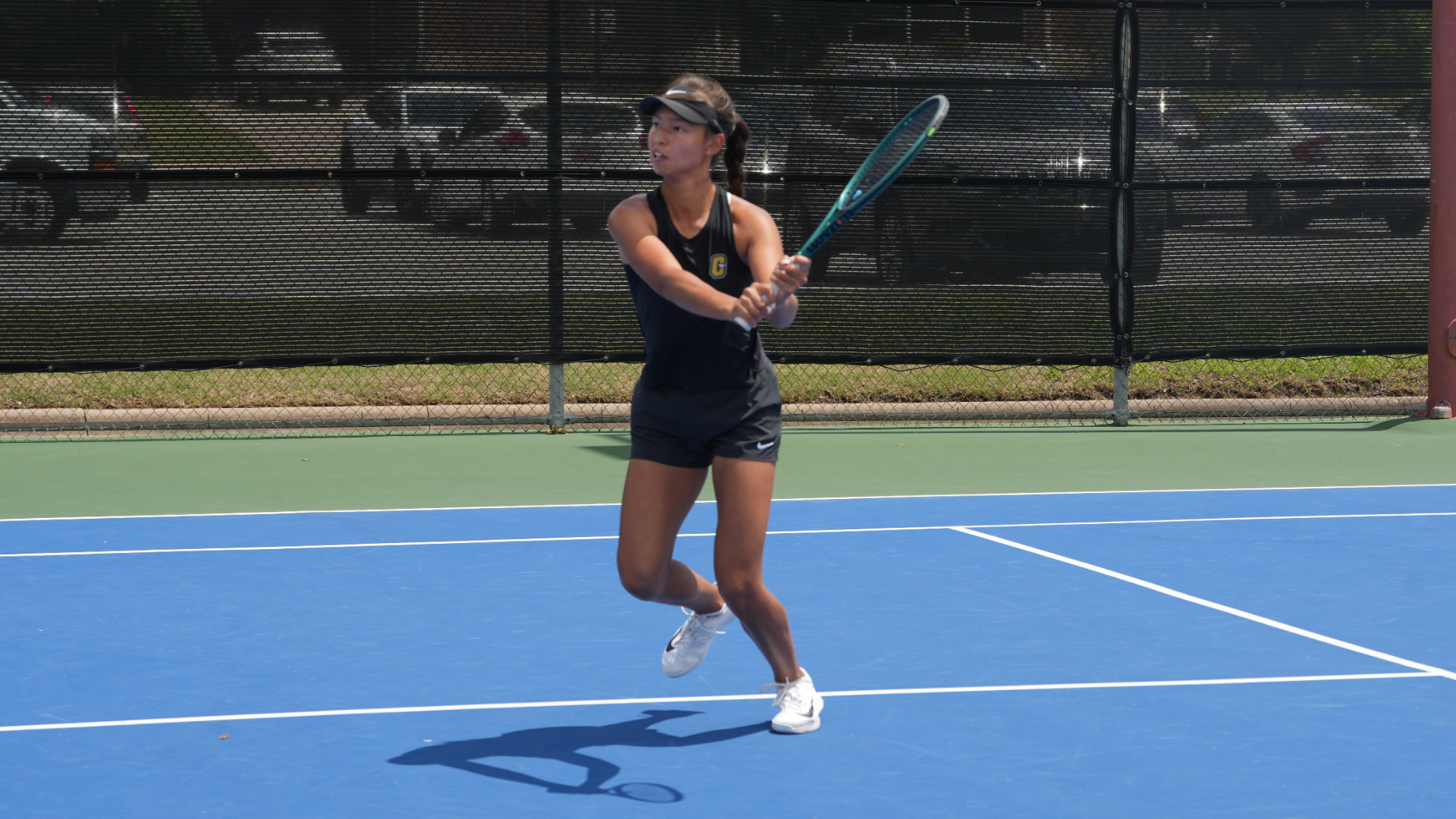 Adel Ismagulova hitting a backhand volley