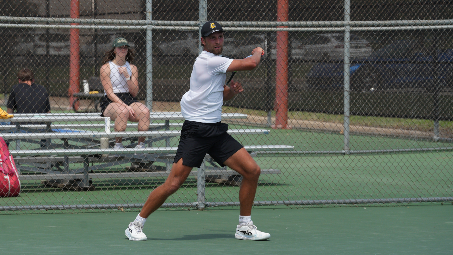 Lukas Janousek following through on a forehand