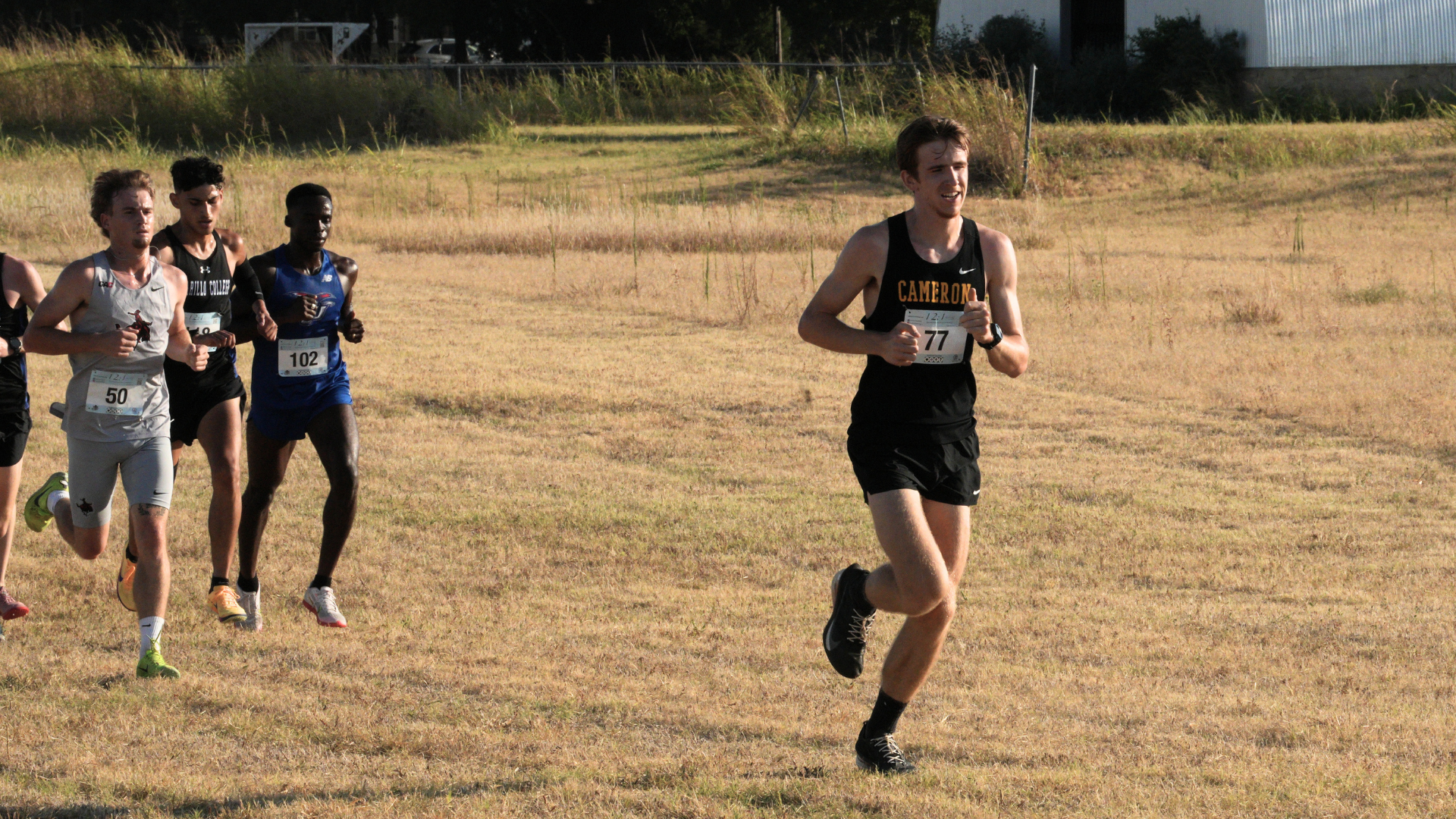 Cameron men’s cross country runner leads a group of competitors across the course during the Aggie Duels in Lawton.