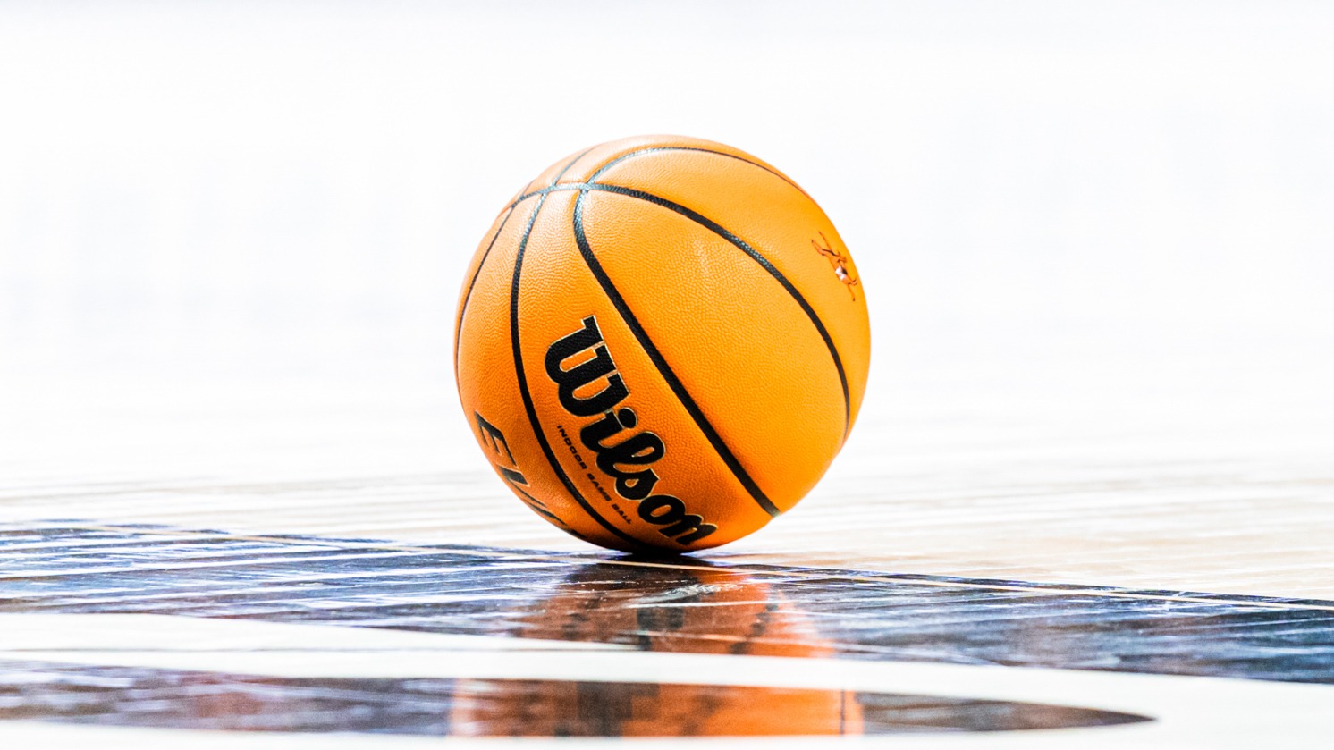 Tight shot of single basketball on court