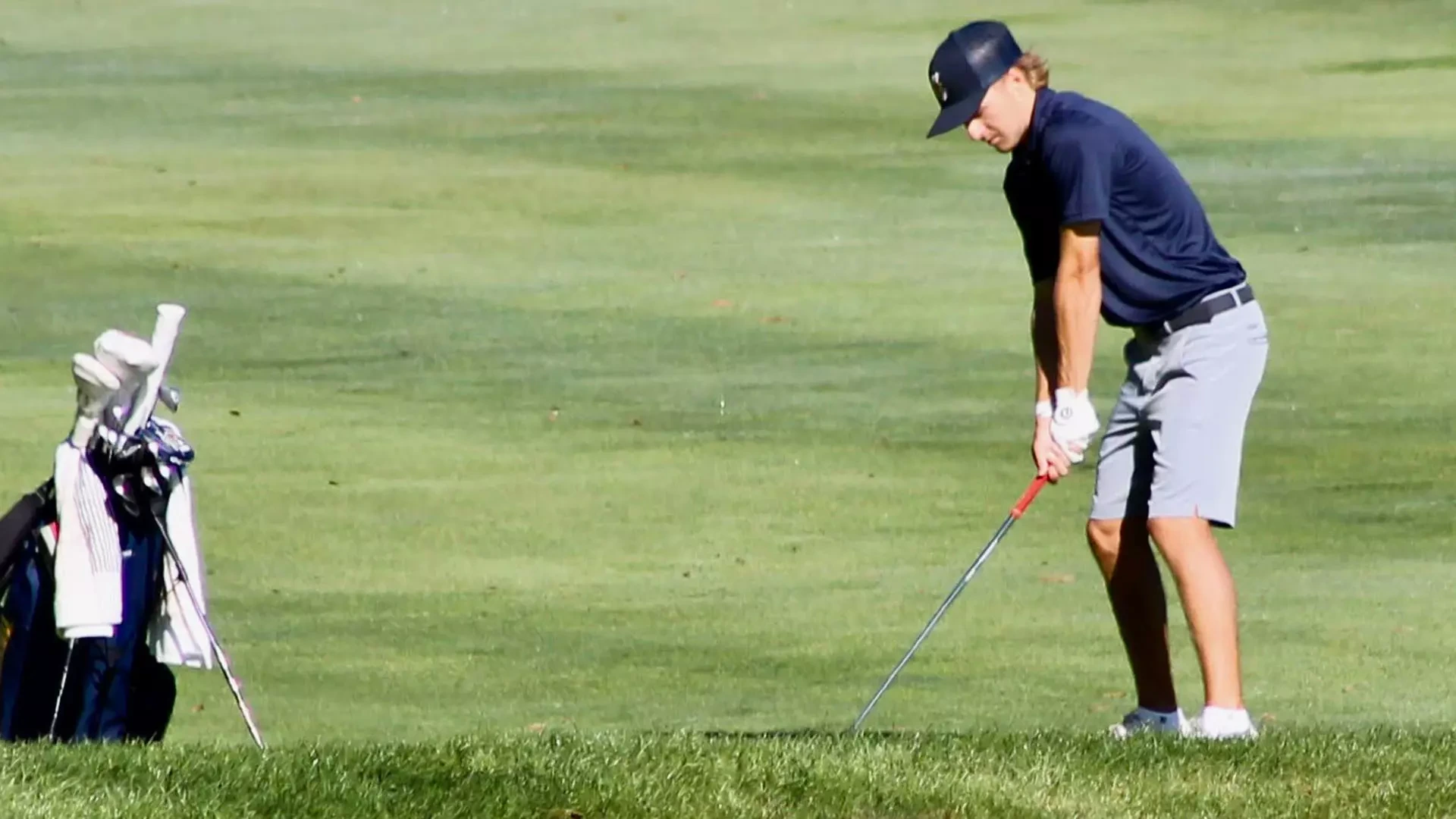 Adam Cichowski lines up an approach shot into the green on the second day of the Matthews Auto Collegiate tournament at The Link at Hiawatha Landing in Apalachin, N.Y.