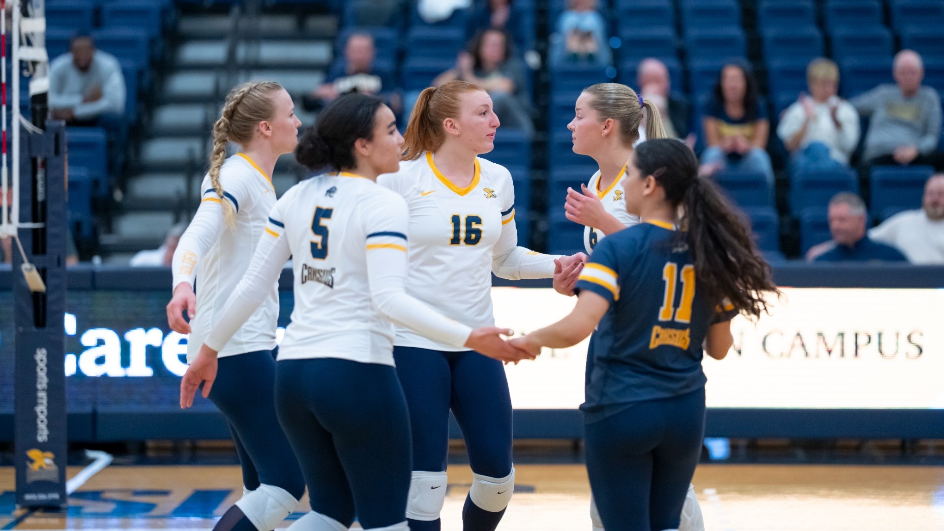 Team huddles vs Iona at the koessler athletic center in buffalo, NY on September 26th 2025