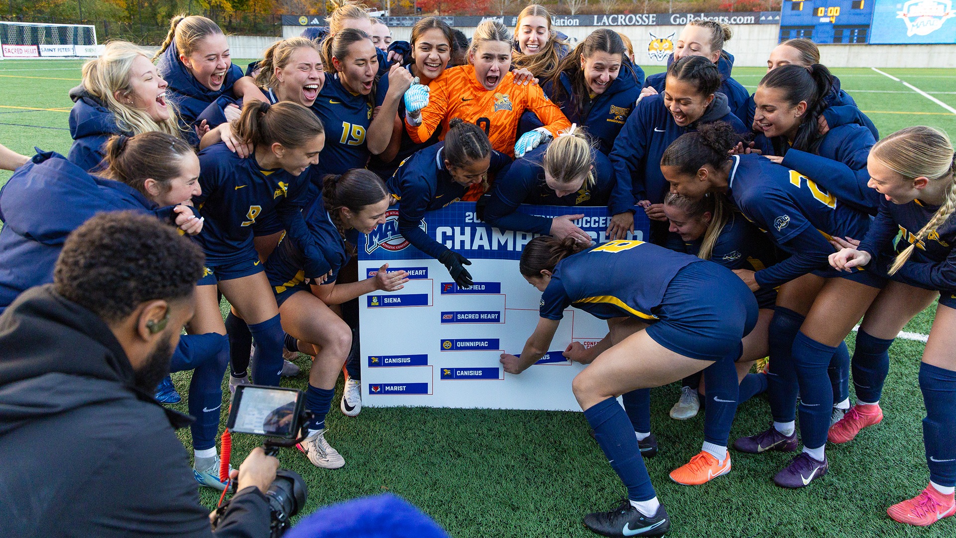 Members of the Canisius women's soccer team celebrate after advancing to the MAAC Women's Soccer Championship with a 4-3 victory in penalty kicks over Quinnipiac at the Quinnipiac Soccer and Lacrosse Stadium on Nov. 6, 2025