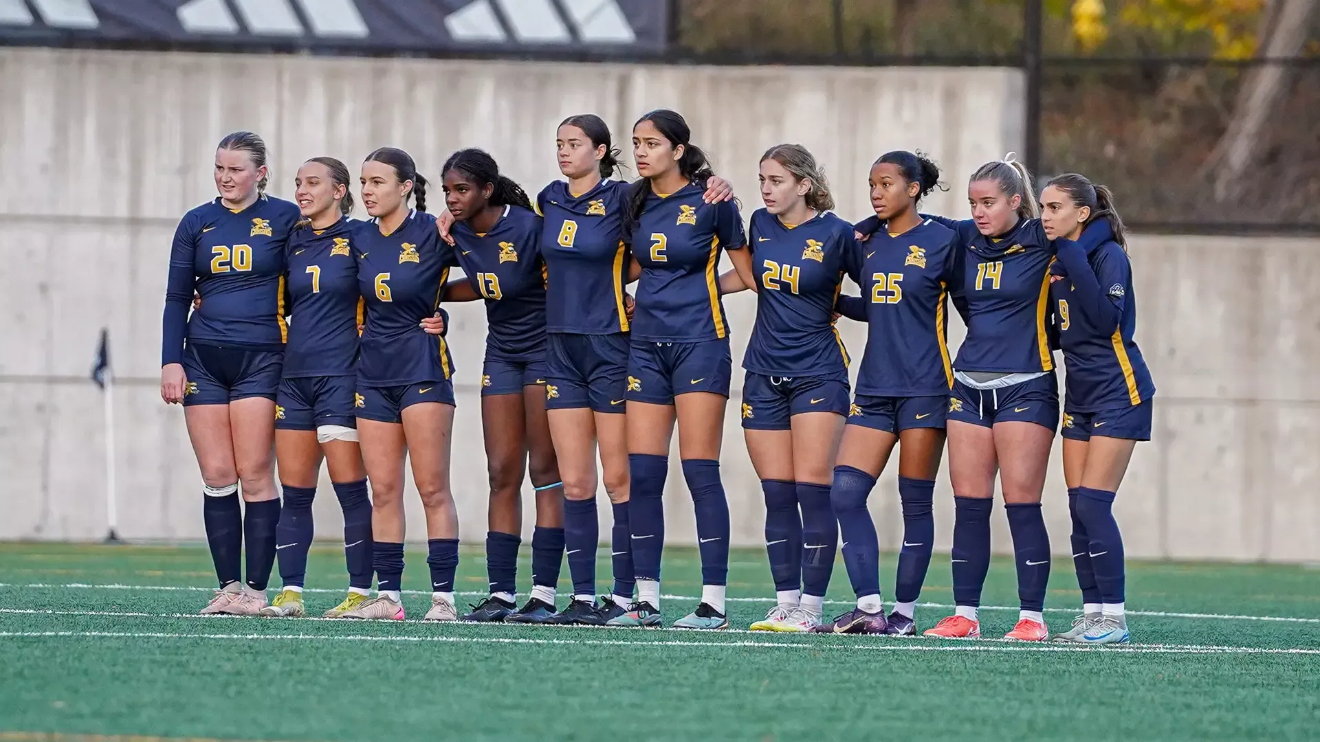 Members of the Canisius women's soccer team stand together during penalty kicks against Quinnipiac at the Quinnipiac Soccer and Lacrosse Stadium on Nov. 6, 2025
