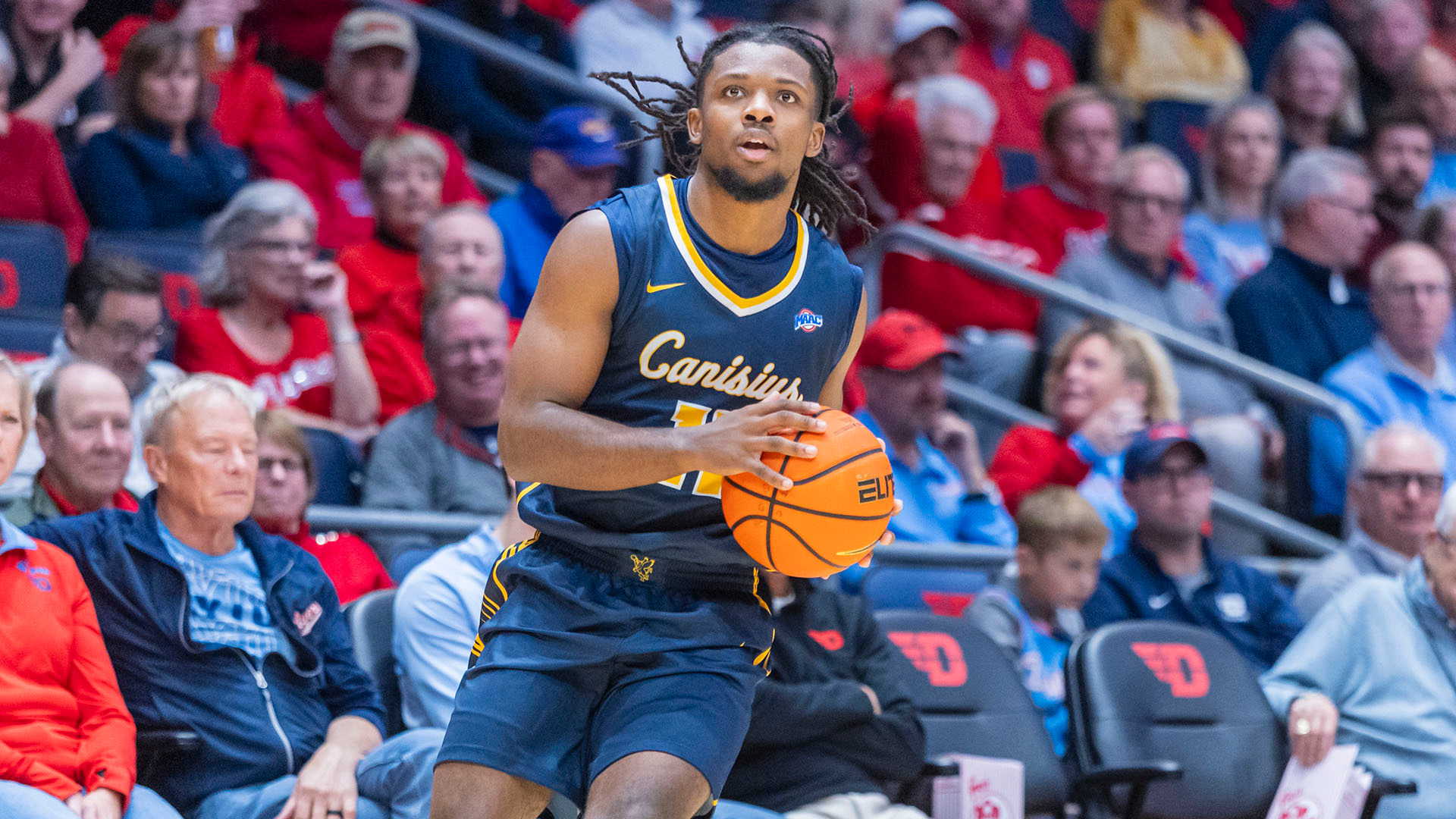 Kahlil Singleton pulls up for a 3-point shot in a road game at Dayton on Nov. 3, 2025.