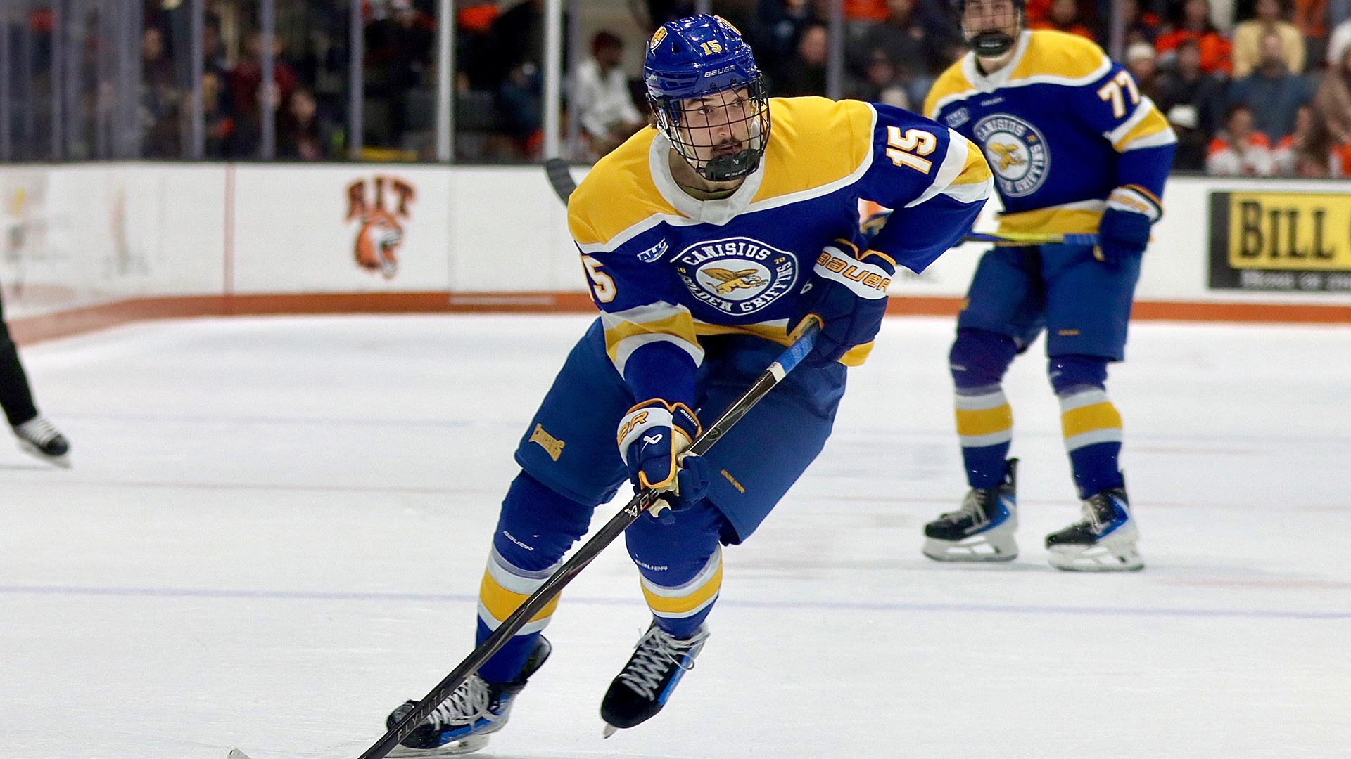 Canisius forward Cole Miller skates with the puck during game action versus RIT at the Gene Polisseni Center on Dec. 5, 2025