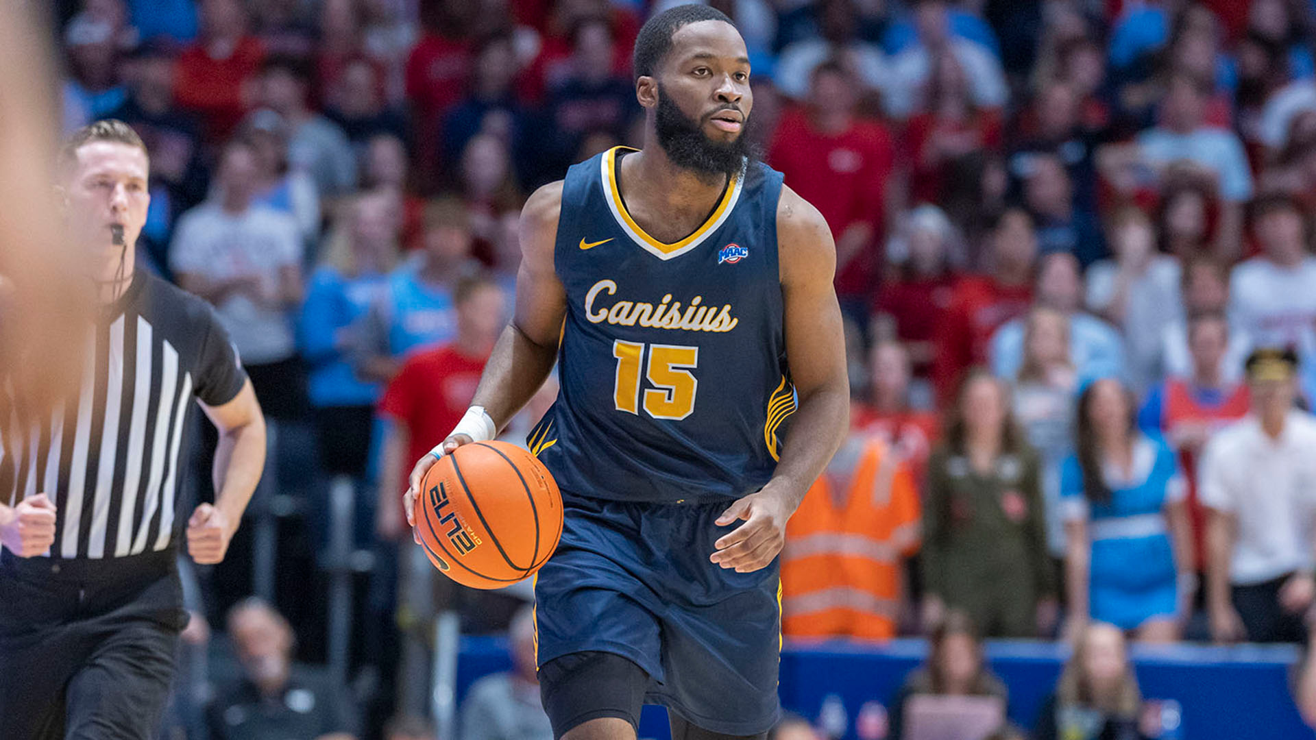 Mike Evbagharu moves the ball up the floor in the first half of a game at Dayton on Nov. 3, 2025.