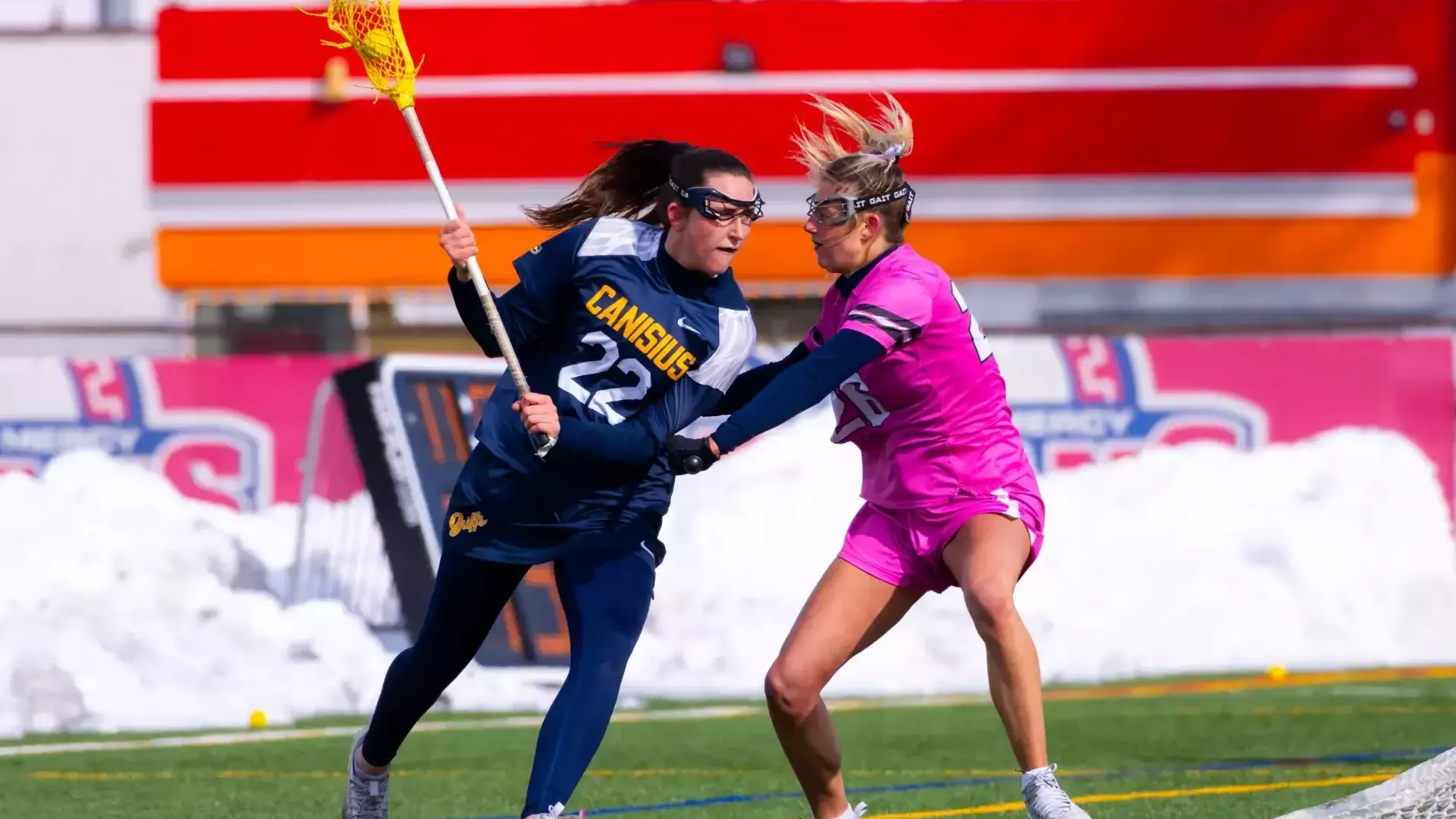 Maggie Tifft battles a defender as Detroit Mercy hosts Canisius for a Pink Game on February, 22nd 2025. 