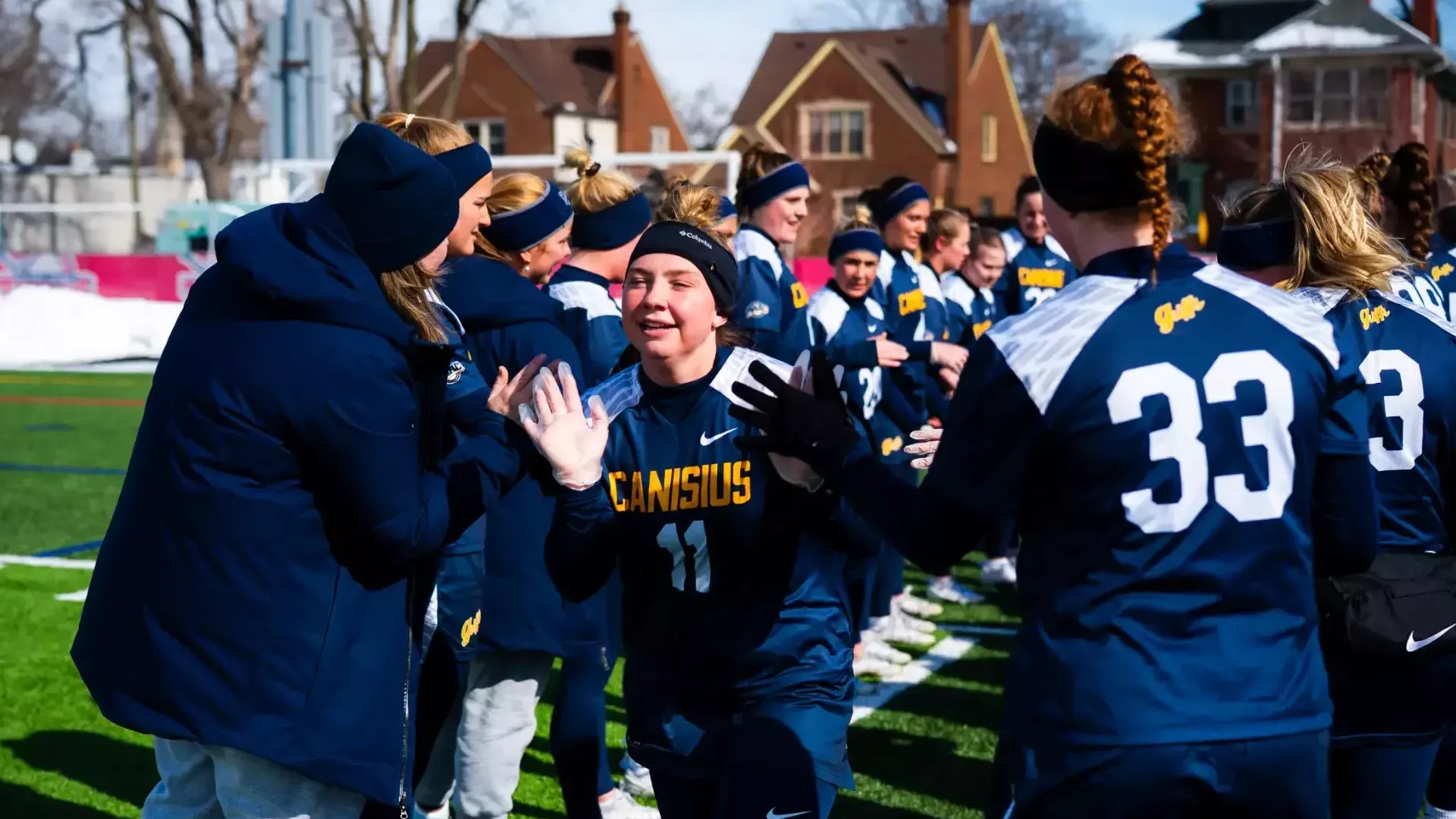 Megan Previdi runs to midfield during player introductions as Detroit Mercy hosts Canisius for a Pink Game on February, 22nd 2025. 