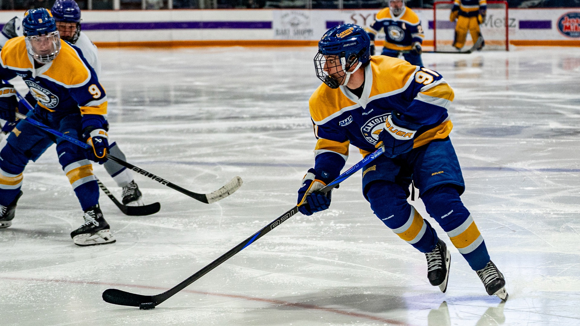 Canisius forward Alton McDermott skates with the puck during game action versus Niagara at Dwyer Arena on Feb. 22, 2025